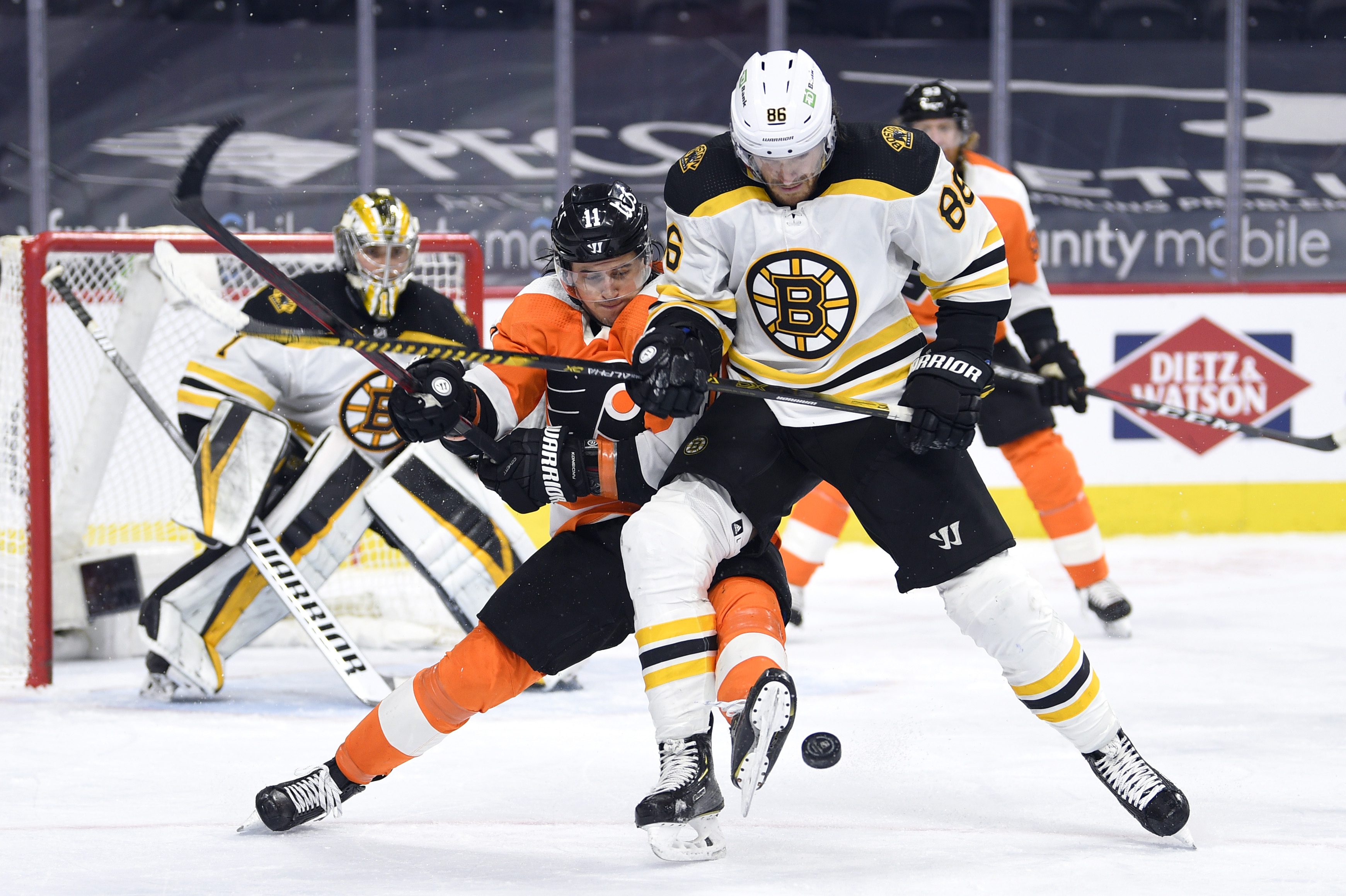 Kevan Miller fights for the puck with Philadelphia's Travis Konecny during the third period Tuesday night.