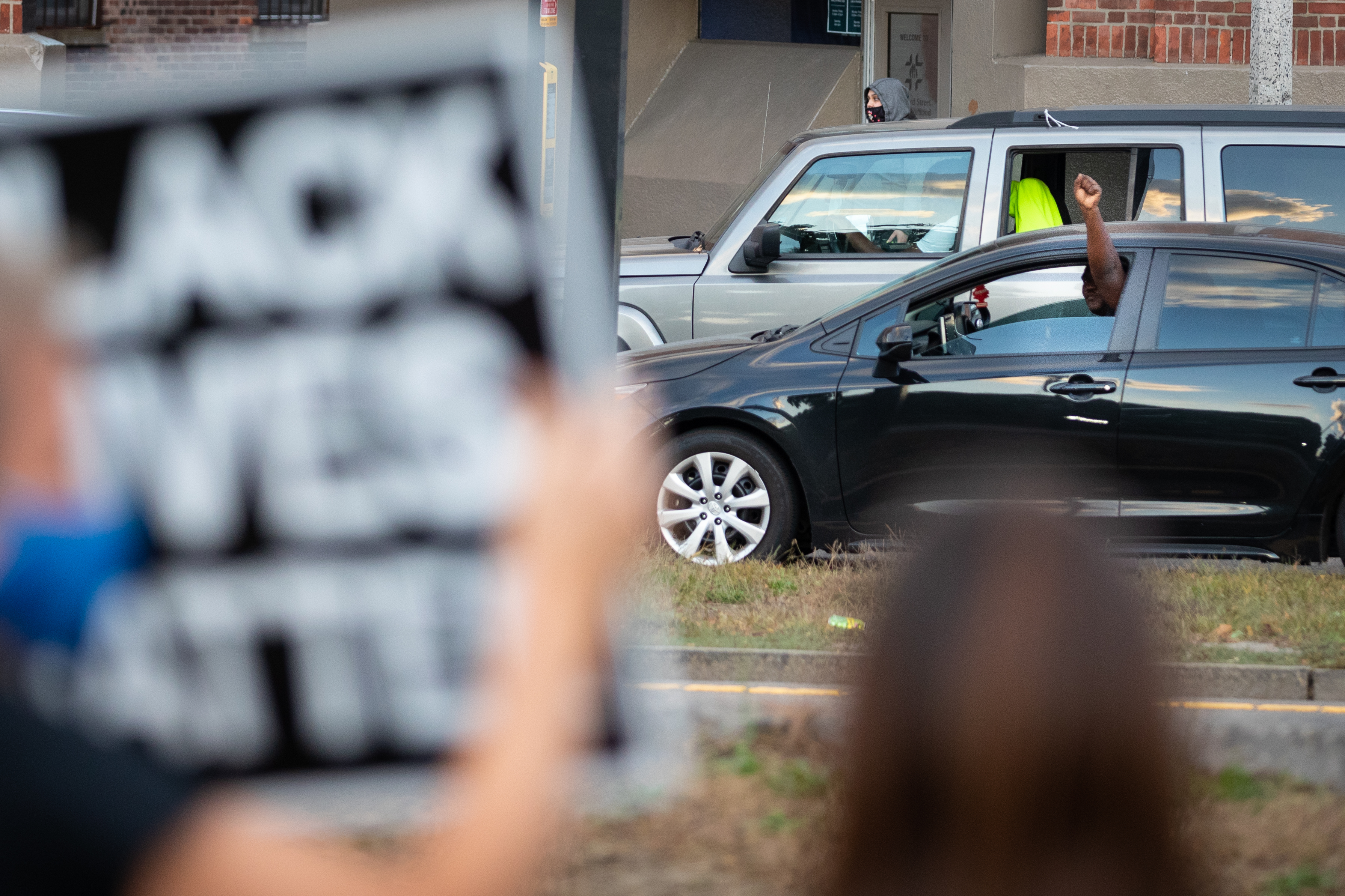 A passing motorist put their fist out of the window in solidarity.
