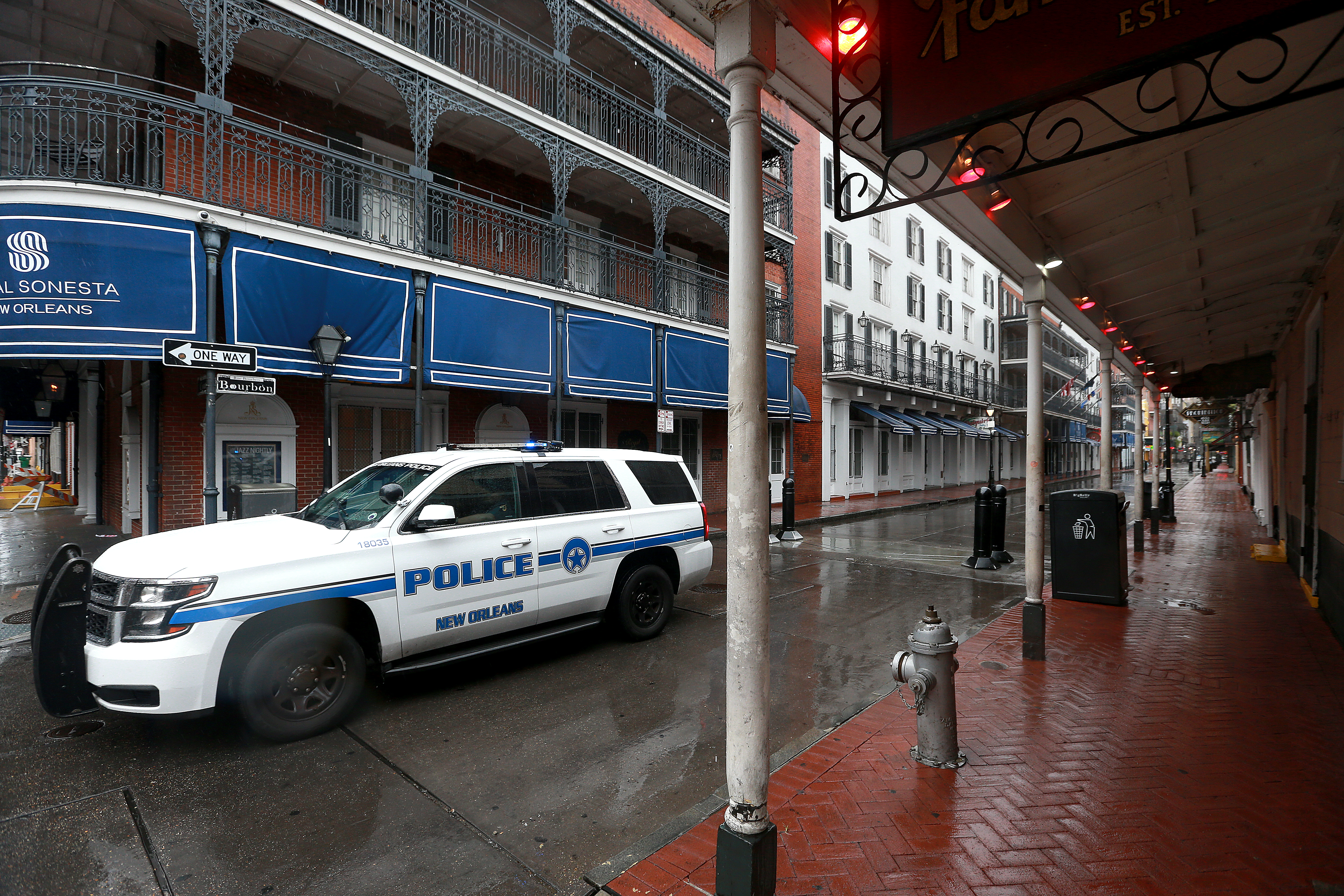A New Orleans Police Department vehicle patrolled the French Quarter as Tropical Storm Cristobal nears the coast on June 7 in New Orleans, Louisiana.