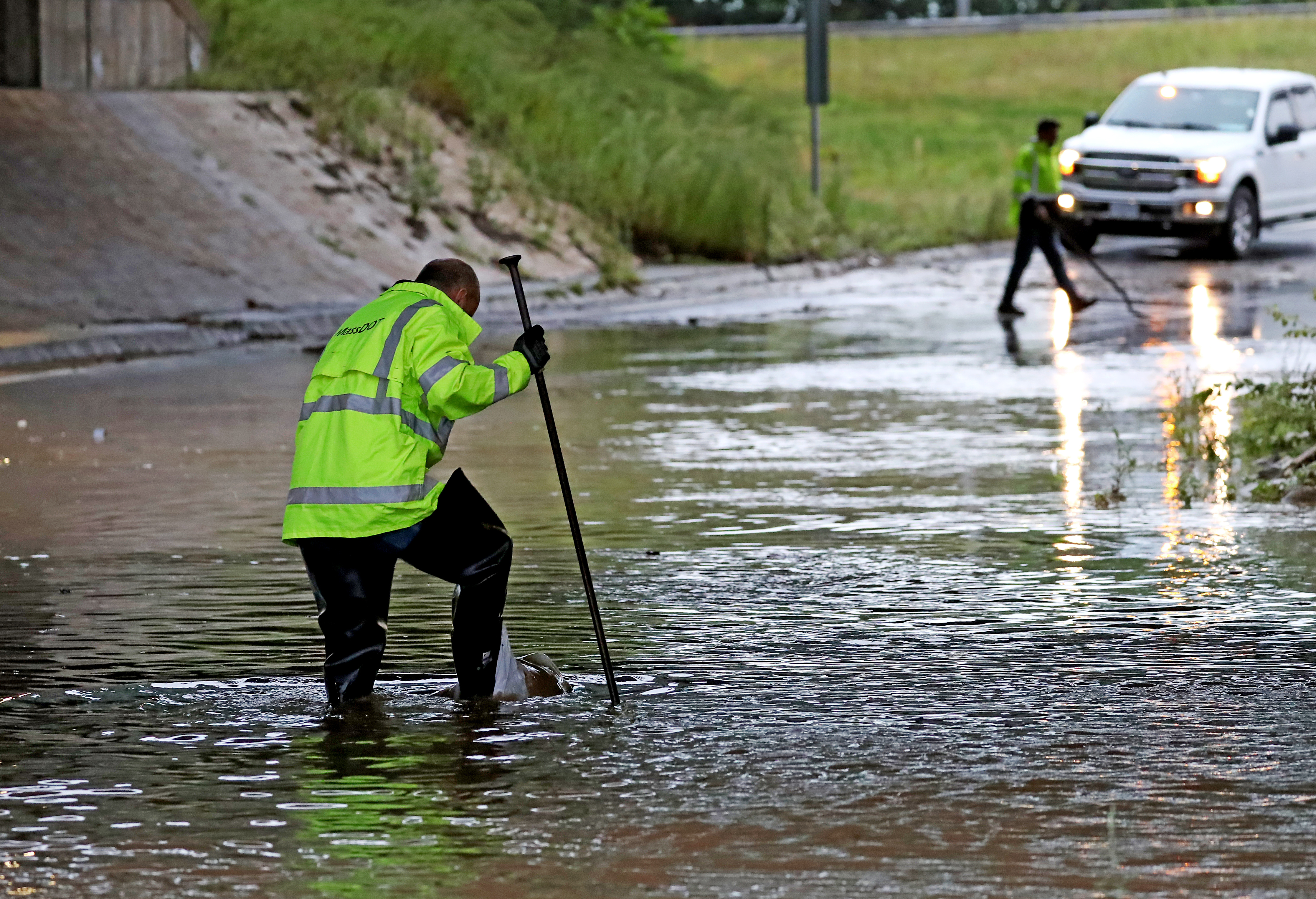 A DOT crew drained the water on Thomas E Burgin Parkway in Quincy on Thursday.