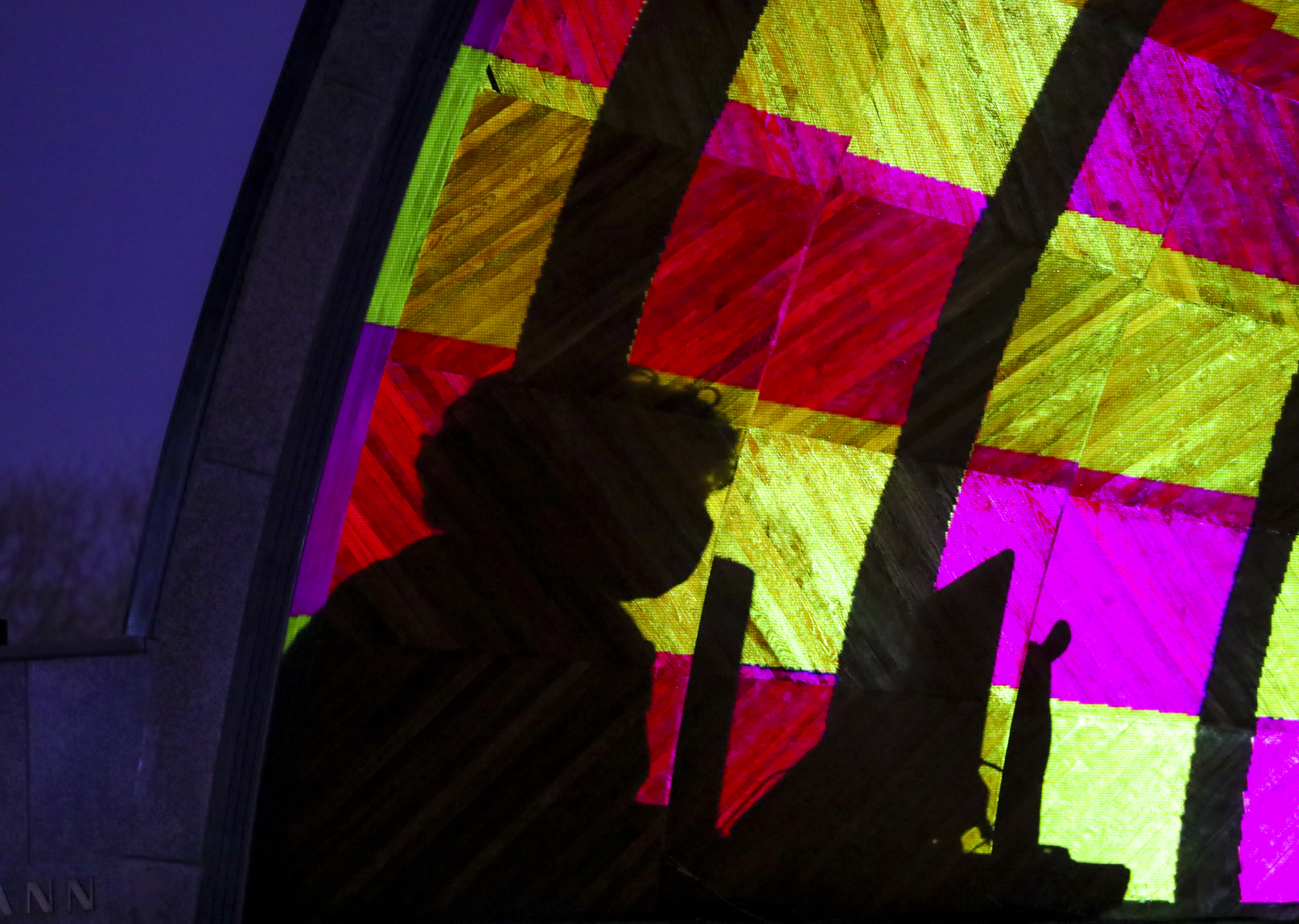 Pamela Hersch worked to coordinate various projectors for the "Hatched" illumination display.