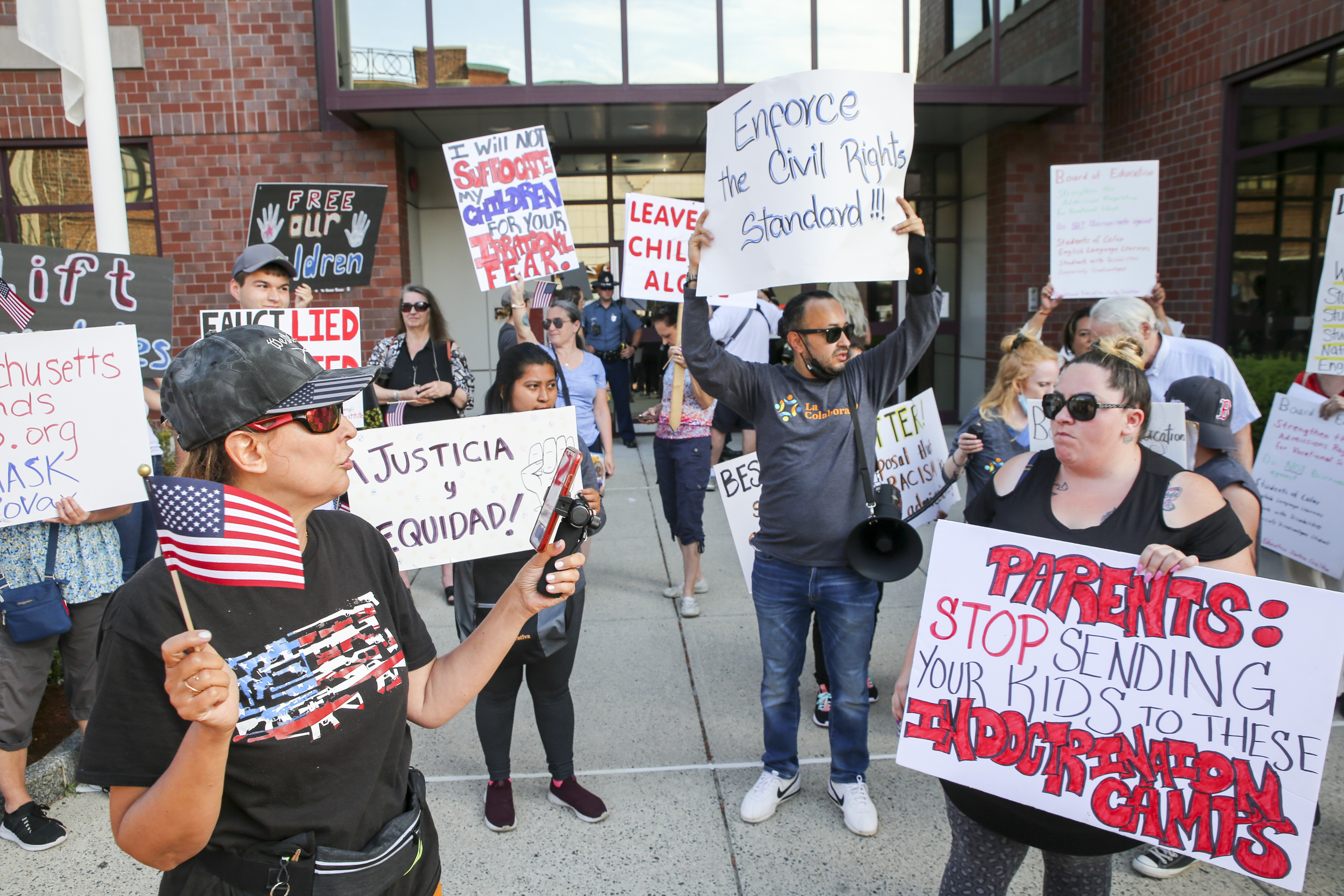 A separate group protesting against mask warrants in schools attempted to eclipse, and at times became at odds with, the Vocational Educational Justice Coalition.