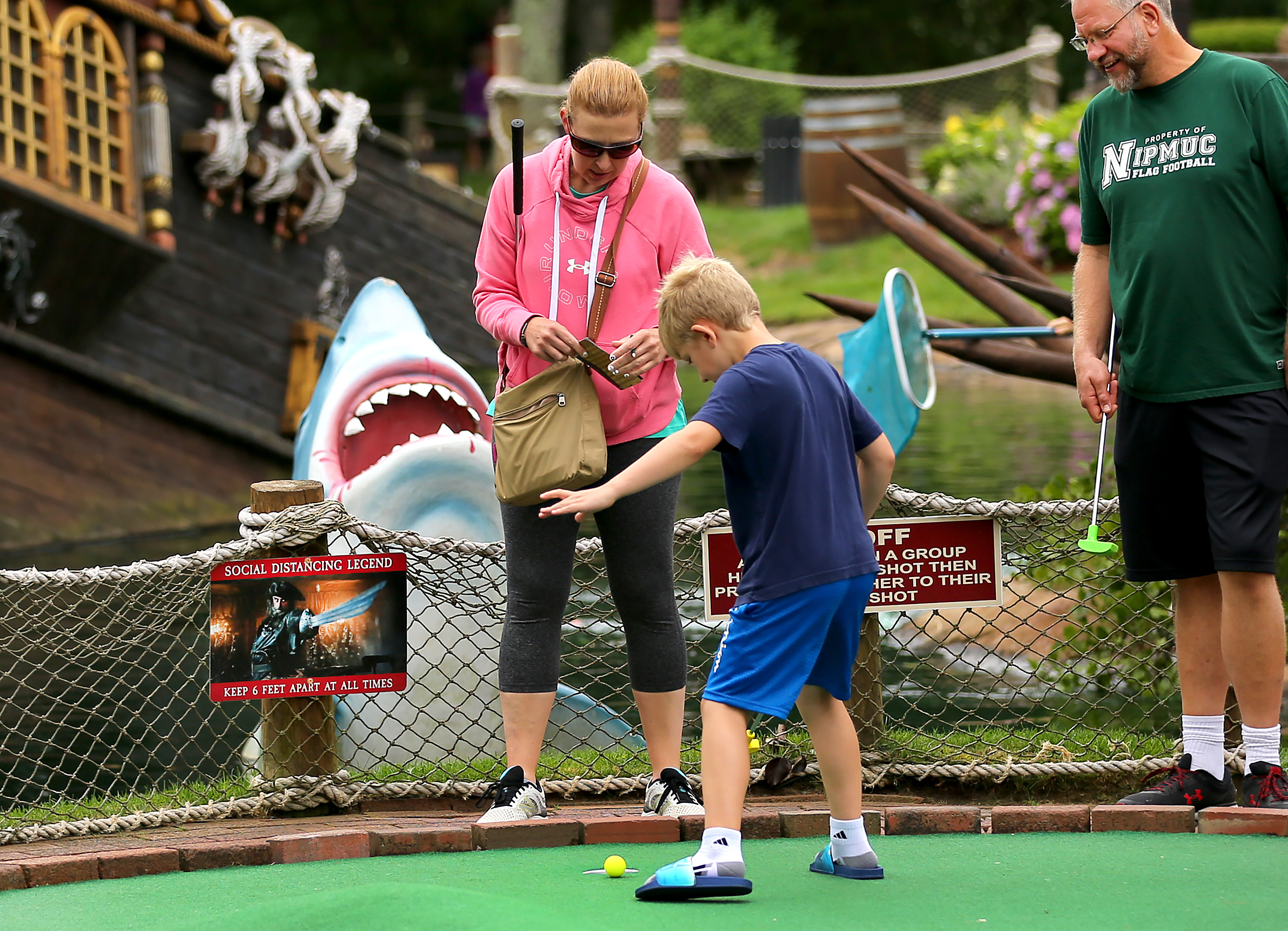 A family played miniature golf at Pirate’s Cove in South Yarmouth.