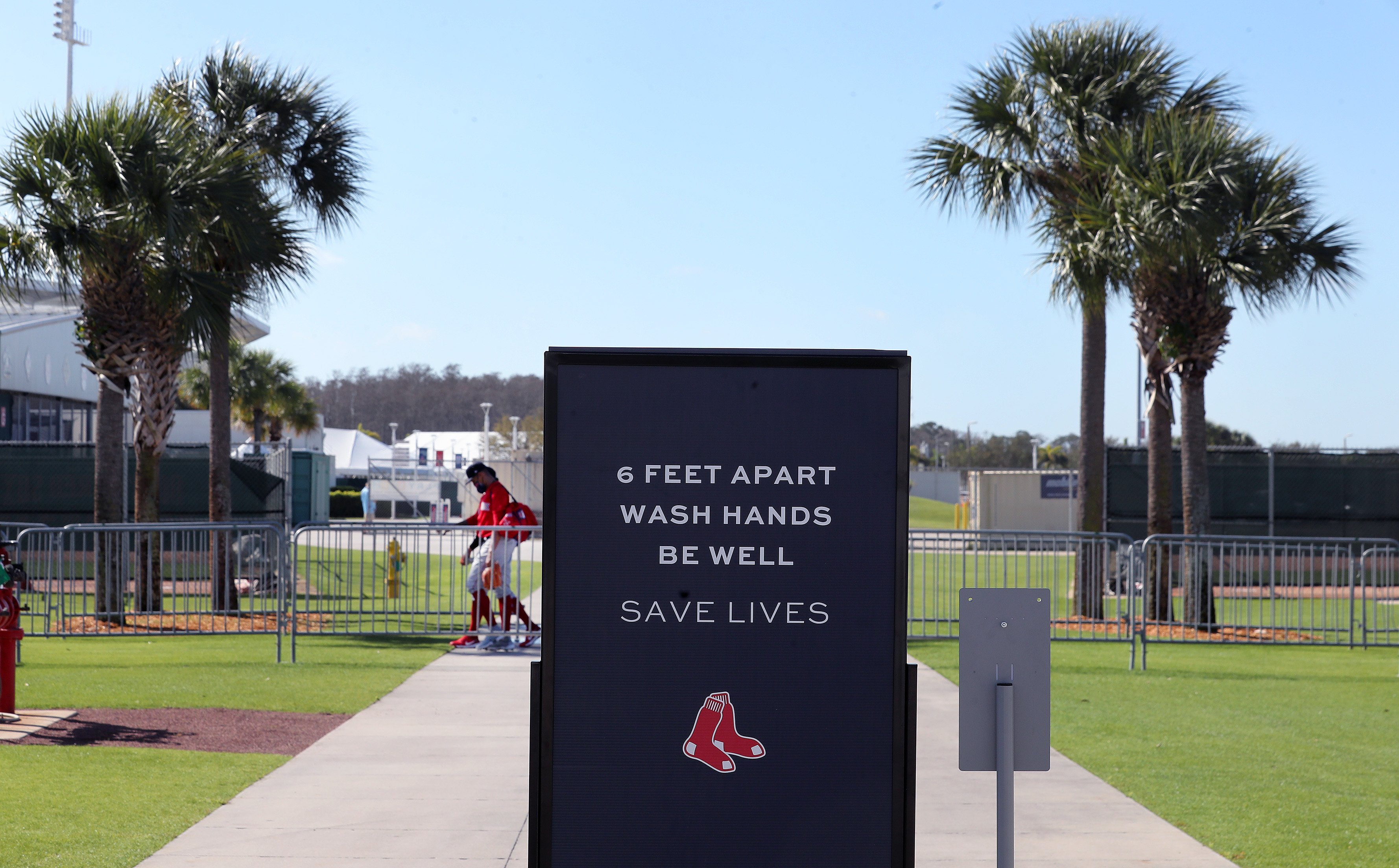 Reminders of pandemic protocols are posted in camp.