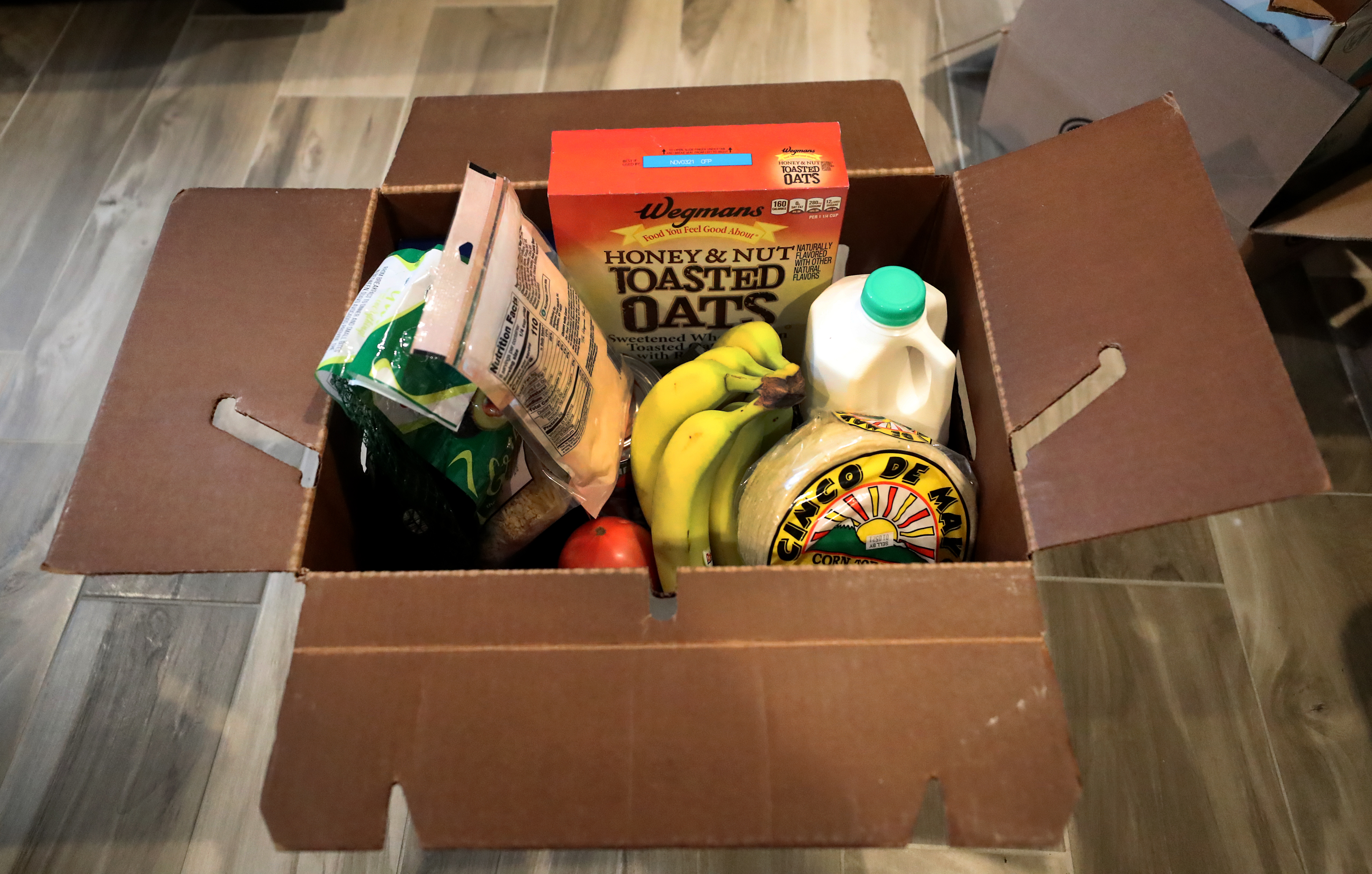 A box of food ready for delivery from FabiYana’s Urgent Foods.