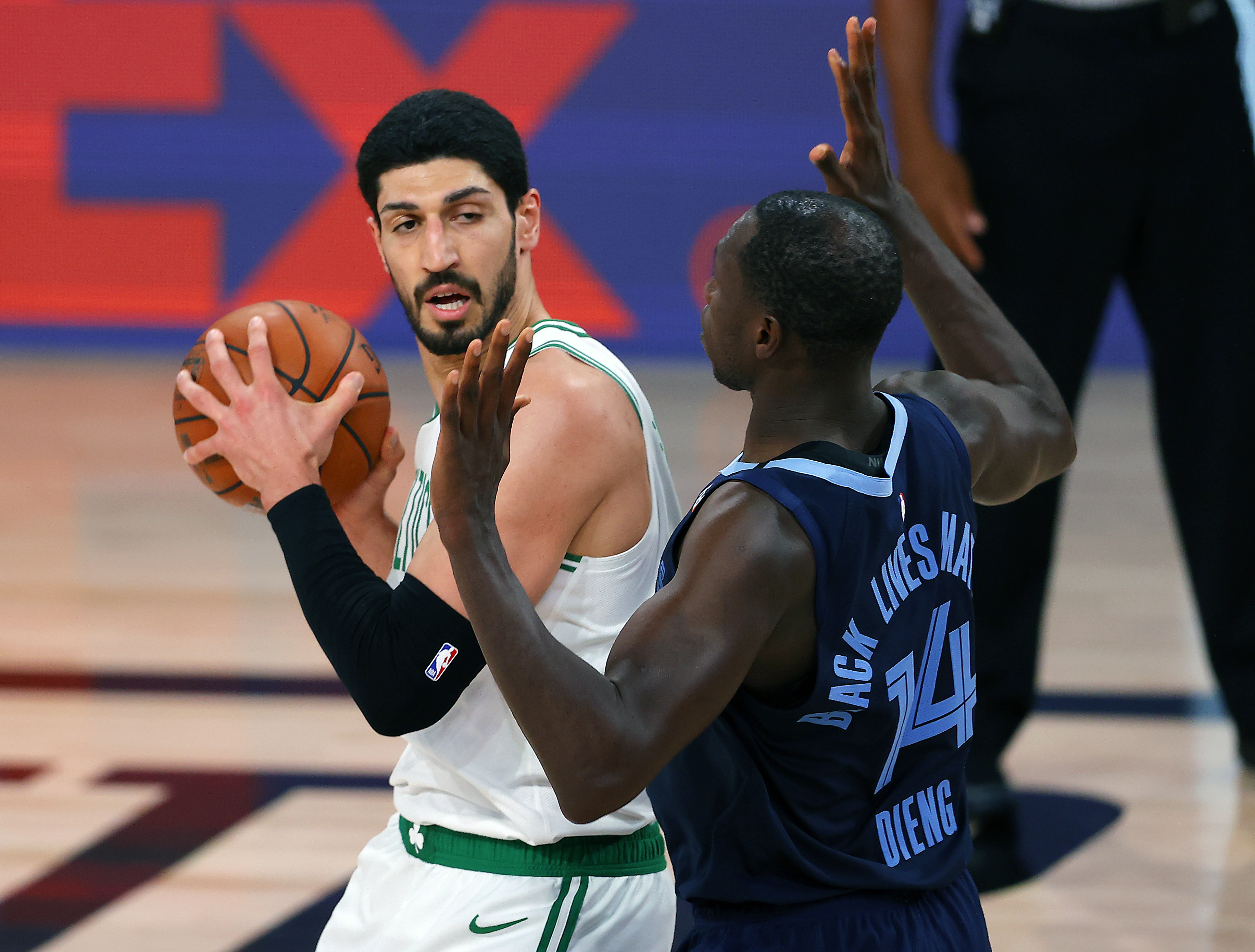 Enes Kanter drives as Memphis' Gorgui Dieng defends during the second half Tuesday's game.