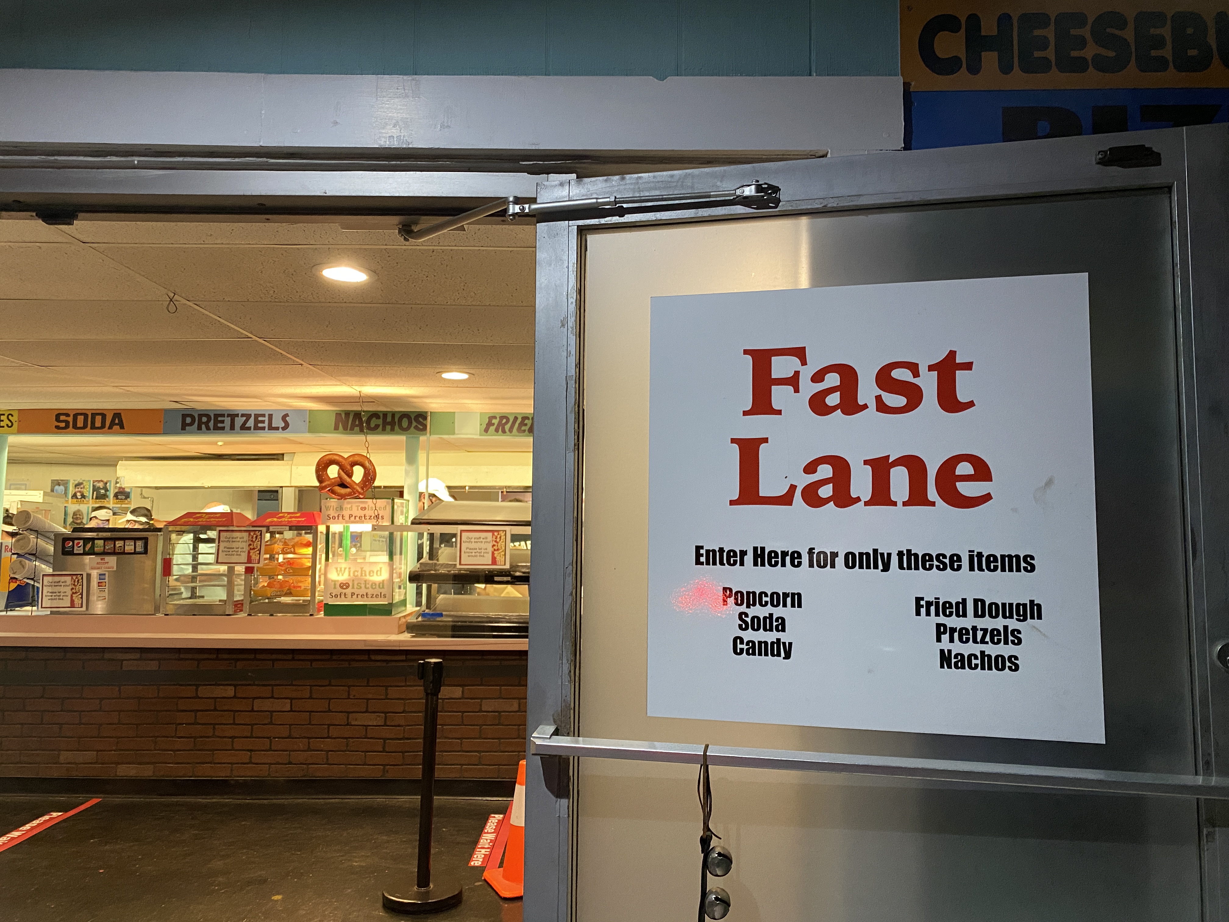 The snack bar at the Mendon Twin Drive-In was mostly empty as patrons opted to order their food over an app on their phone and pick it up at an outside table.
