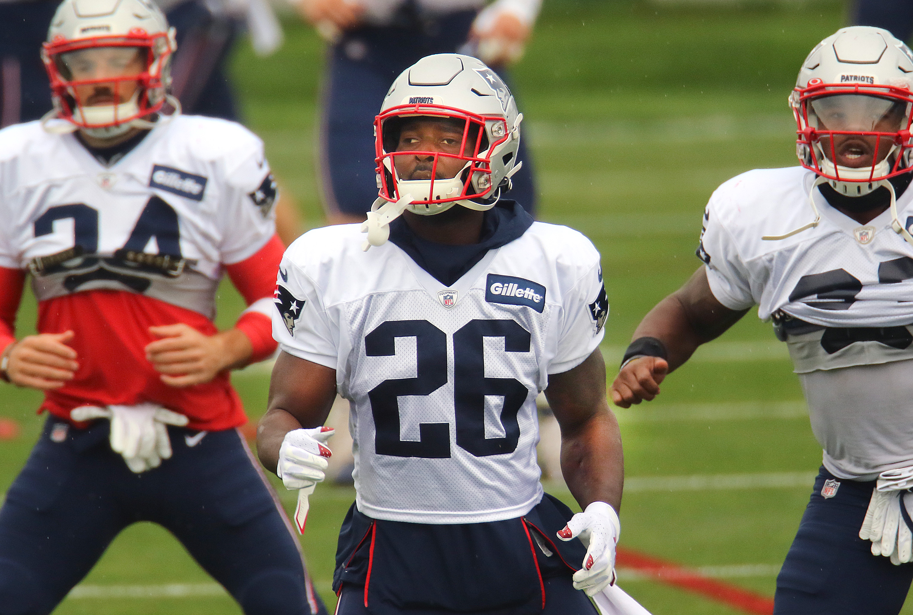 Sony Michel warms up during a recent practice.