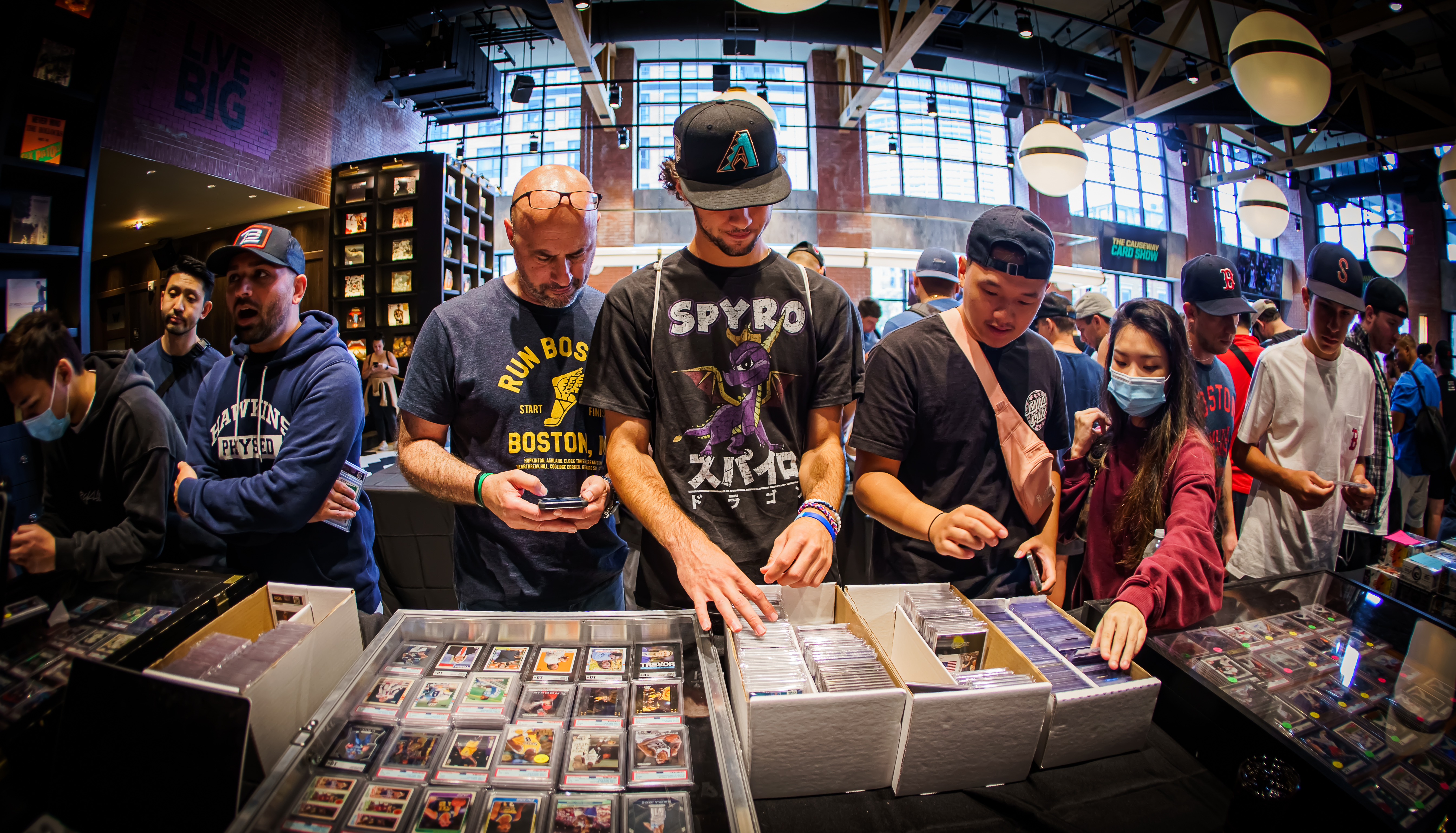 Collectors peruse the selection at the Causeway Card Show.