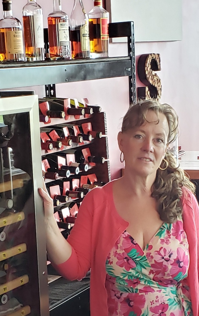 Salut Wine Bar owner Deb Carlson hopes COVID-19 doesn't upend her life's dream.