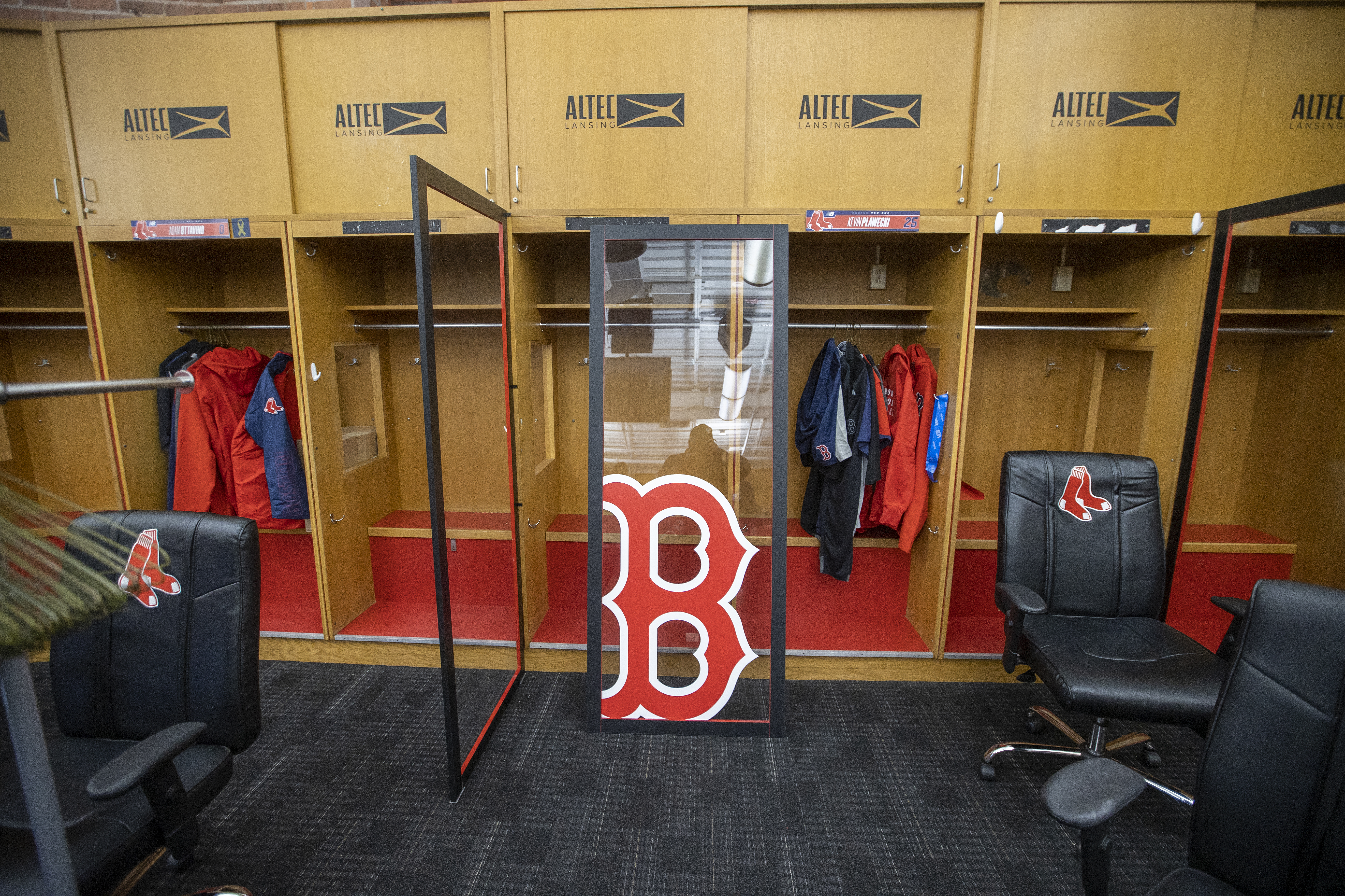 Lockers in the clubhouse were equipped with plexiglass at the start of the season.