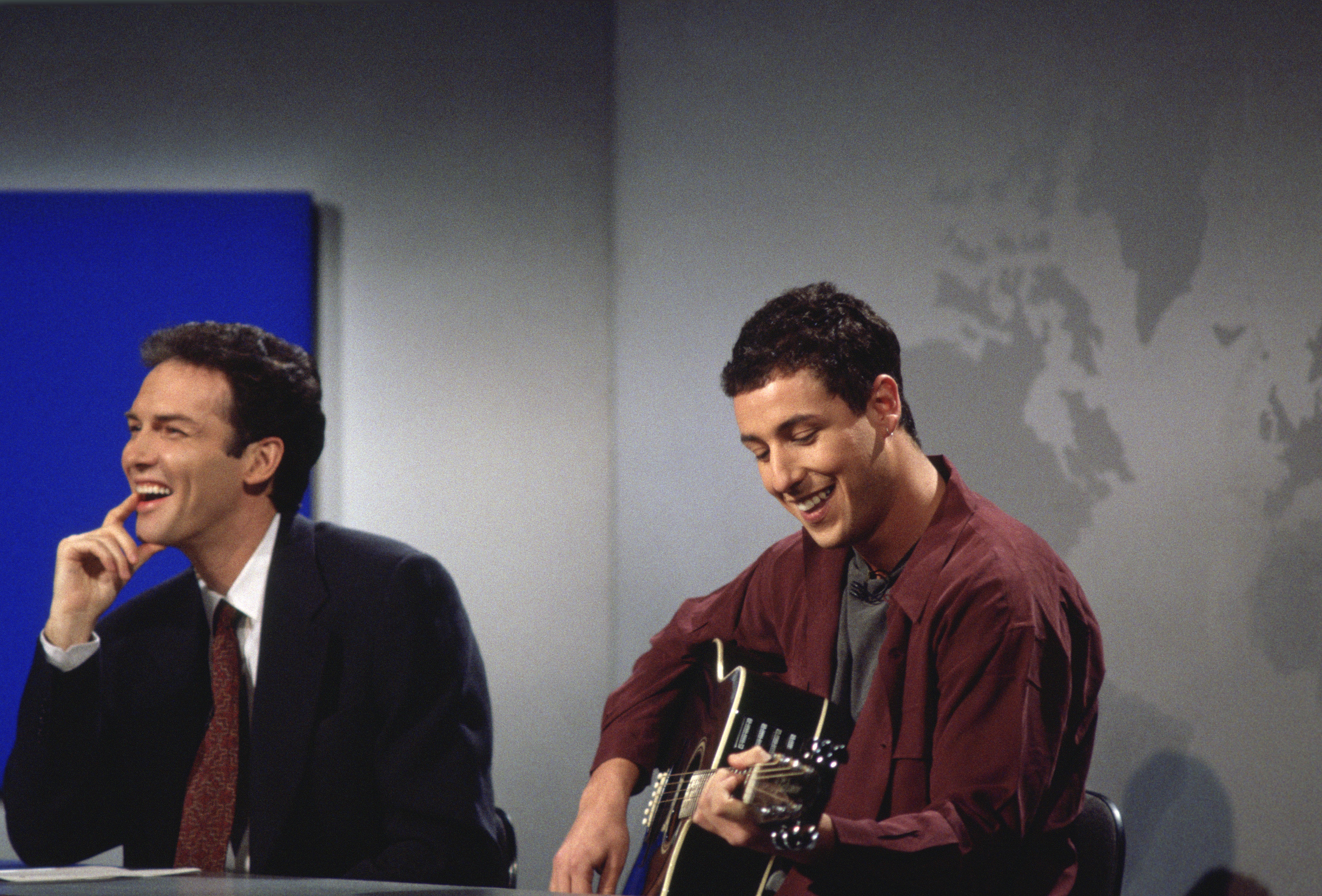 Norm MacDonald (left) and Adam Sandler during "Weekend Update" on December 3, 1994.