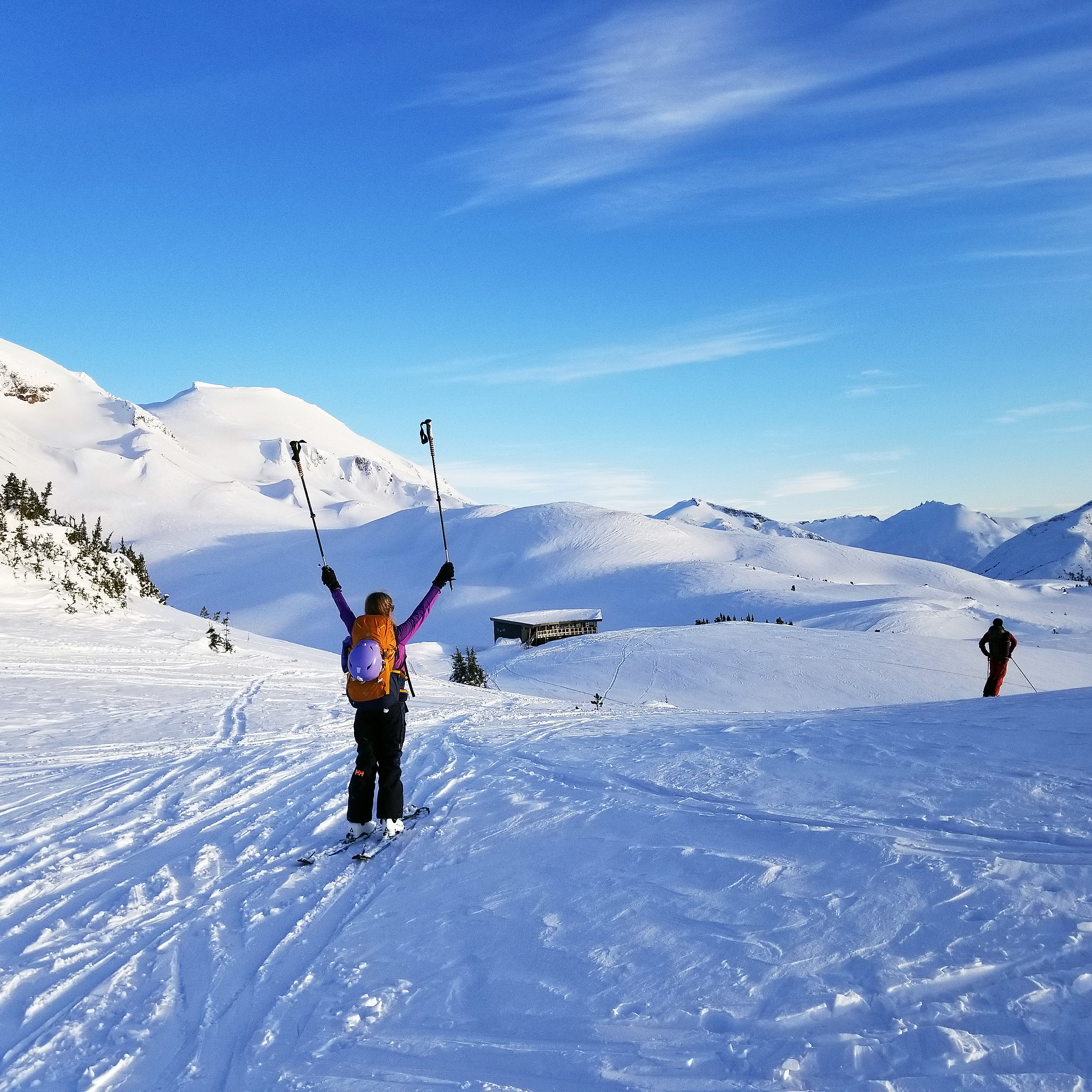 Grace is excited to reach a new wilderness hut in the Spearhead Range several miles from Whistler-Blackcomb Ski Resort.