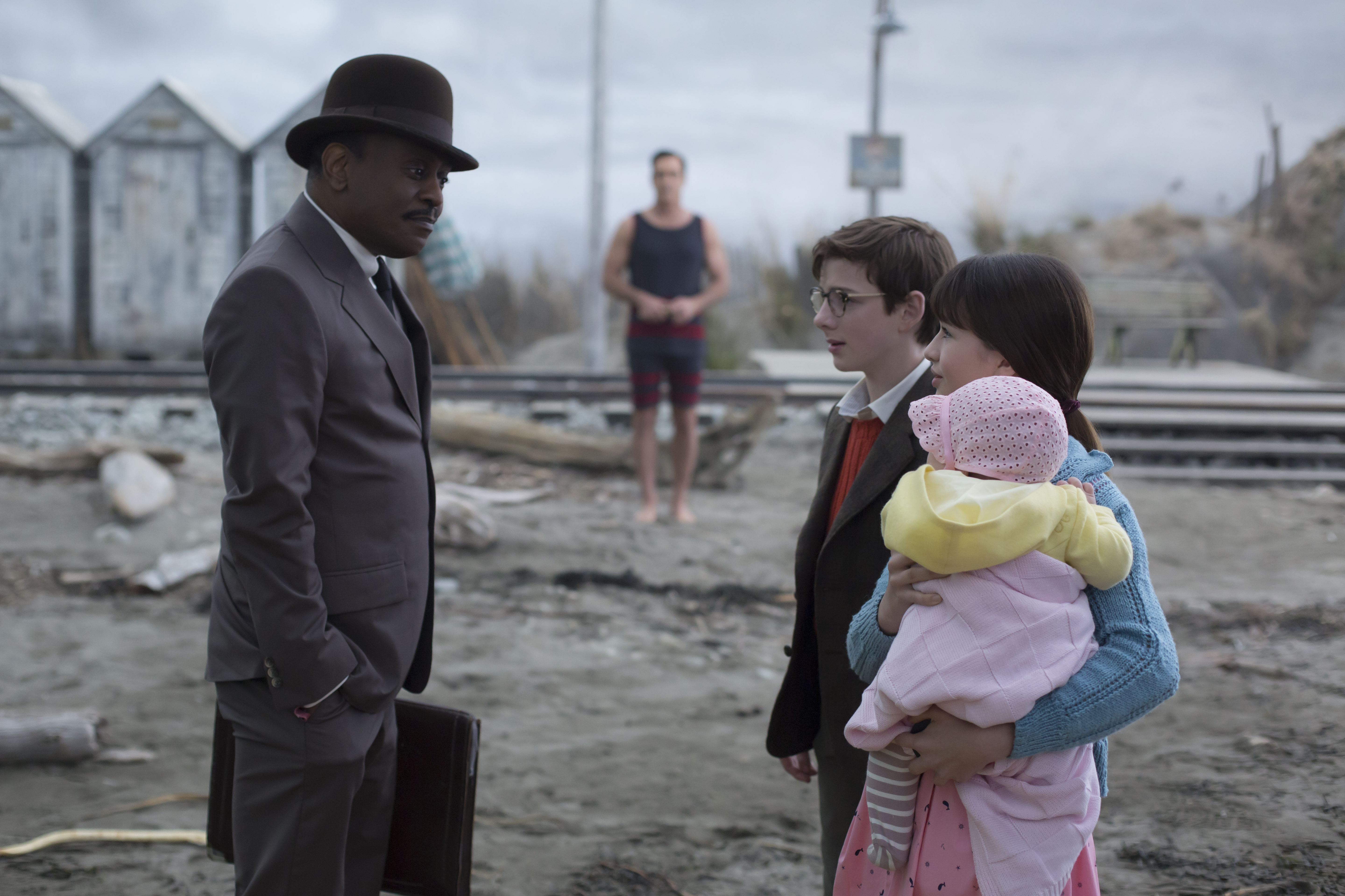 K. Todd Freeman (left), Louis Hynes, and Malina Weissman in Netflix's "A Series of Unfortunate Events."