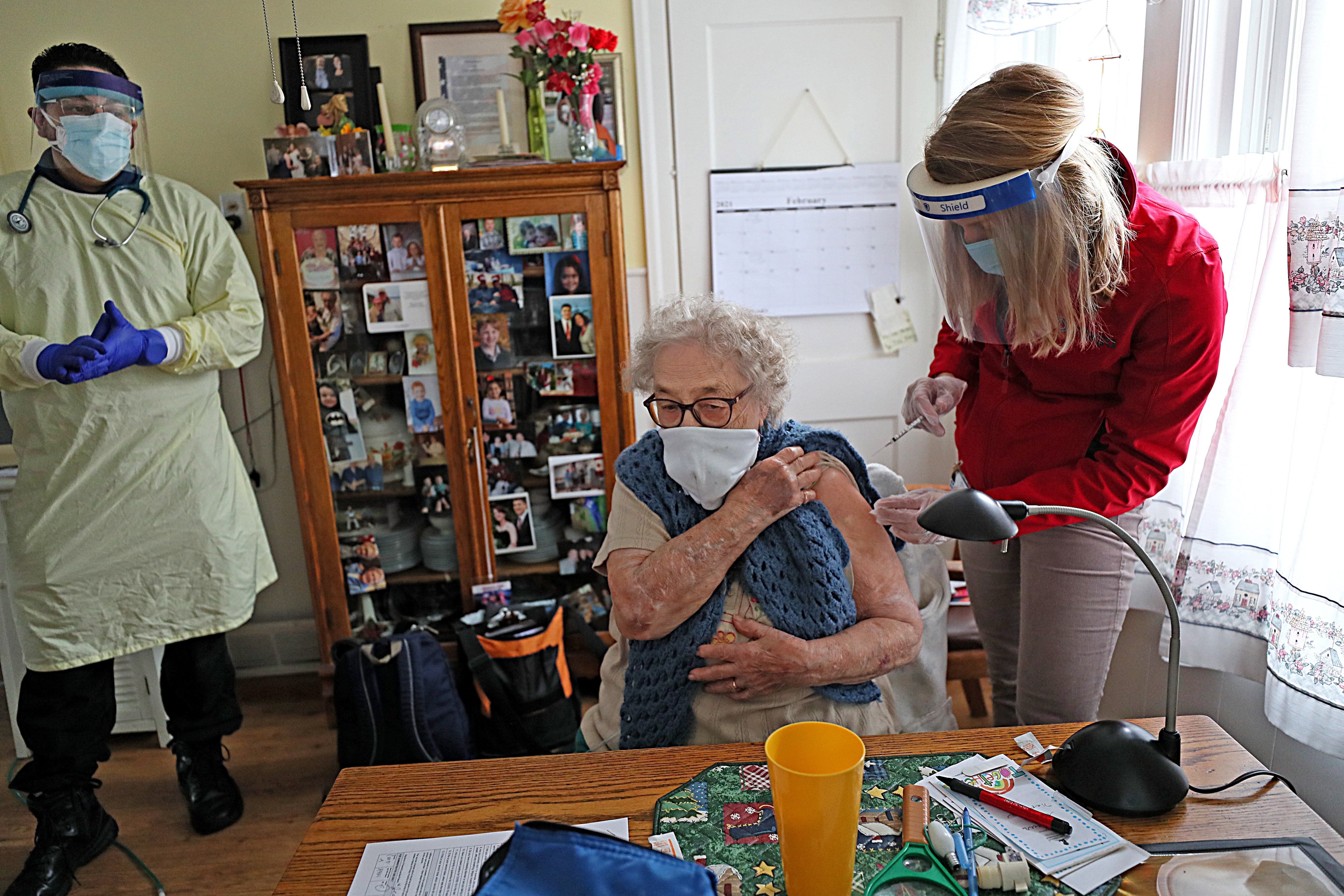 Jeannine Flamand got her coronavirus COVID-19 vaccine in her kitchen at her home. Homebound patients in Rhode Island began receiving doses of the Pfizer vaccine via Integra Community Care Network.