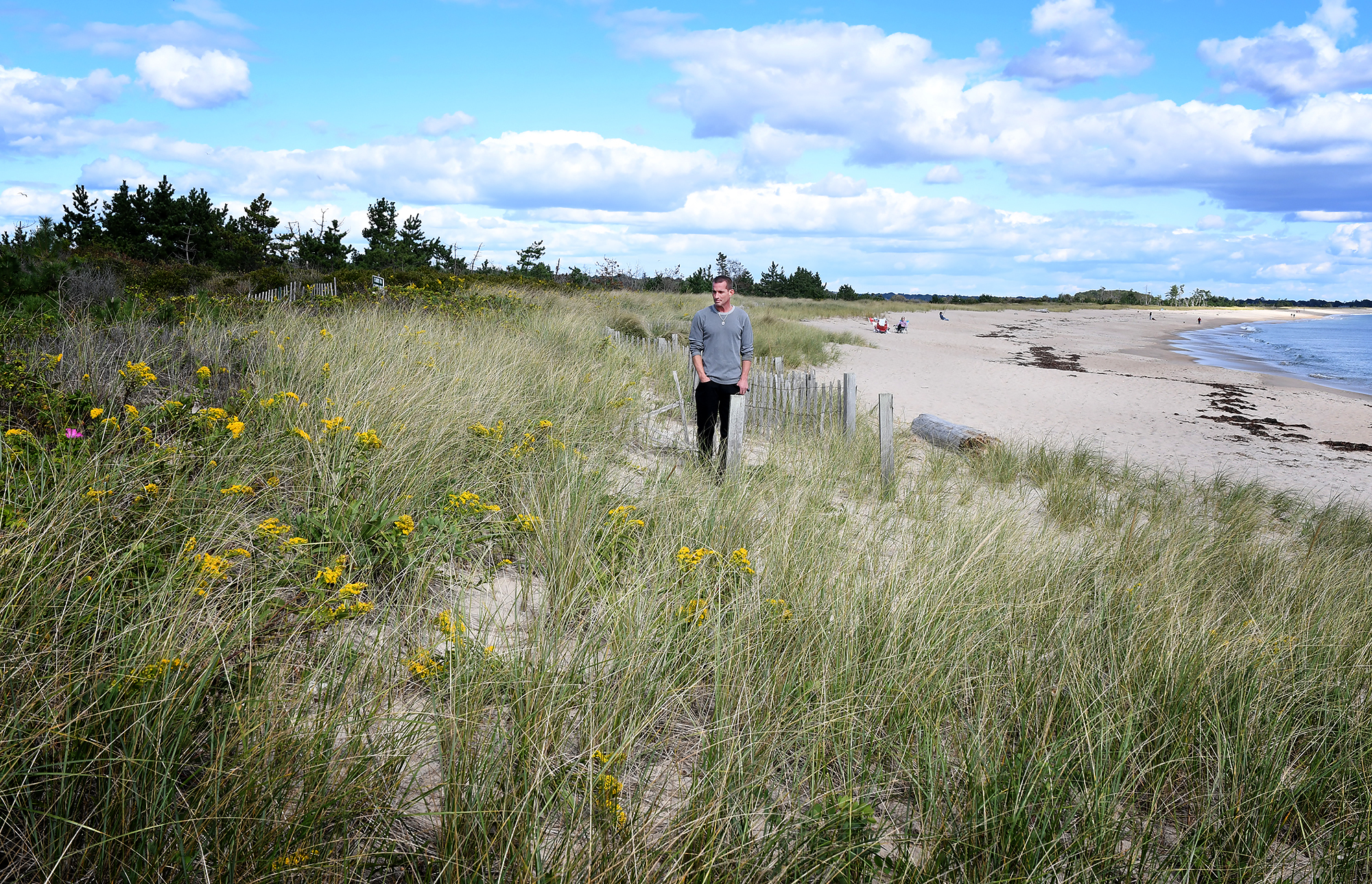Ben Weber, who opposes the blocked right of ways, on Weekapaug Beach.