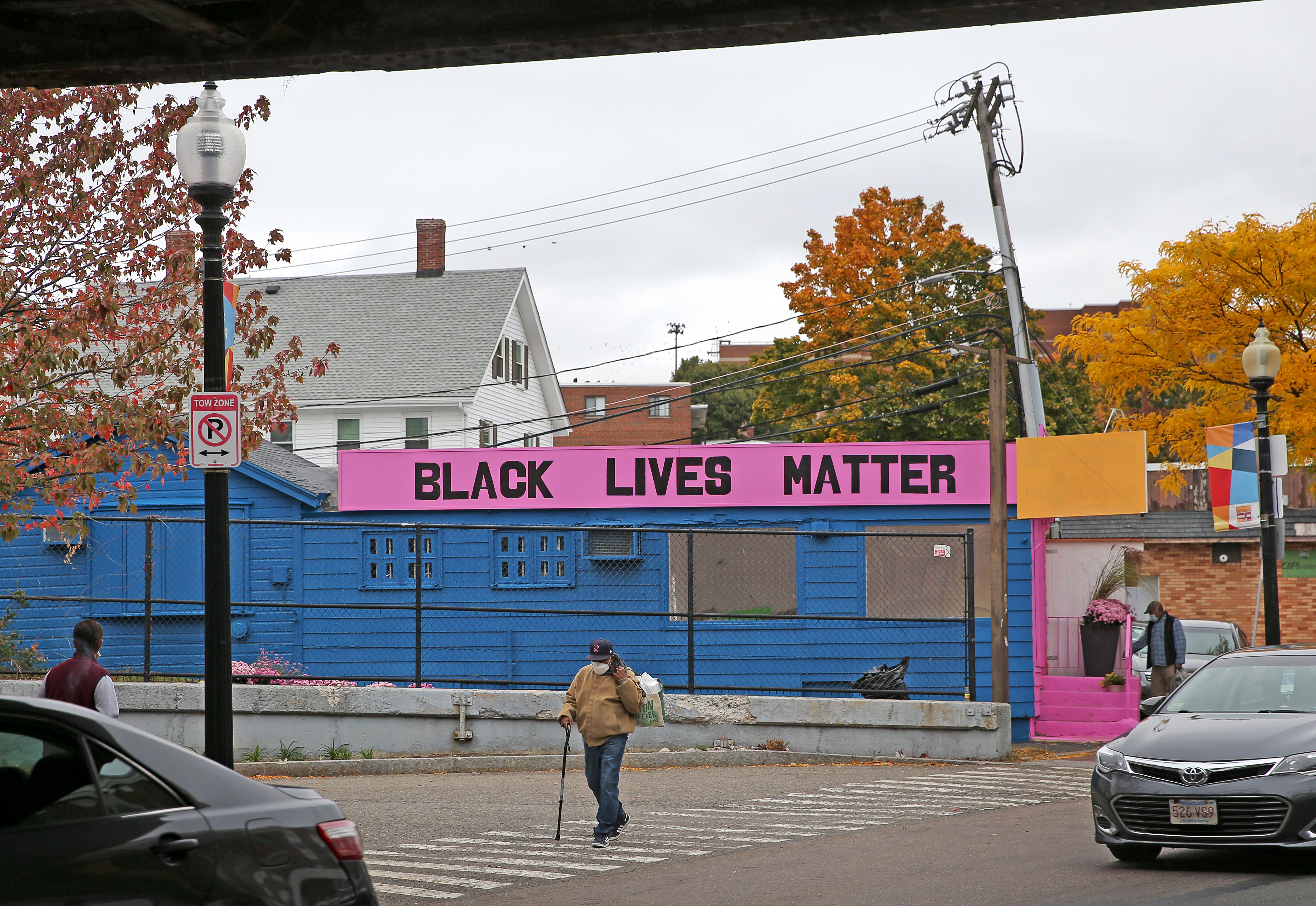 The artist chose bold lettering for his statement on the opposite side of the building.