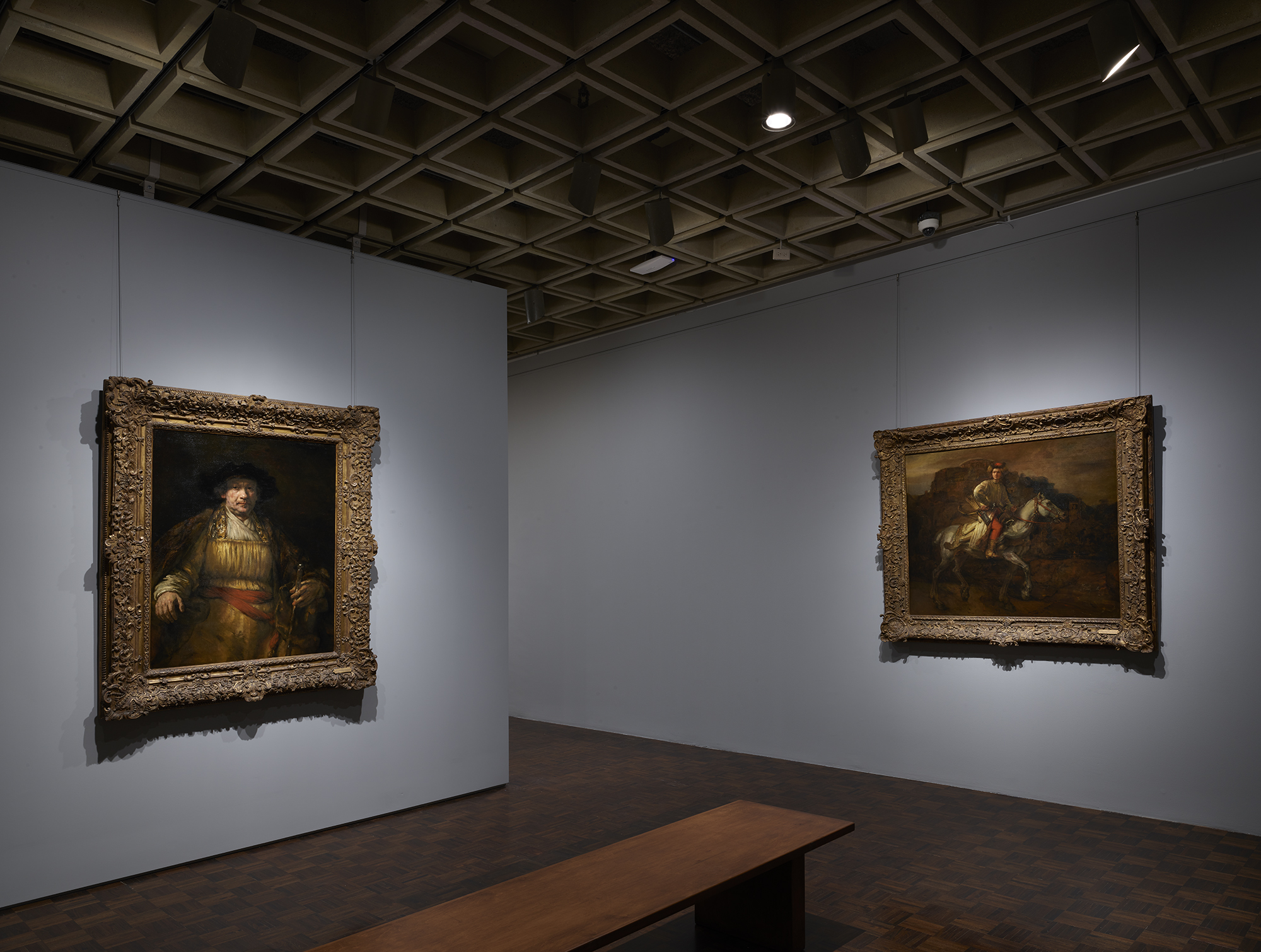 A Rembrandt self-portrait is on the left, from 1658. His "The Polish Rider, circa 1655, is on the right.