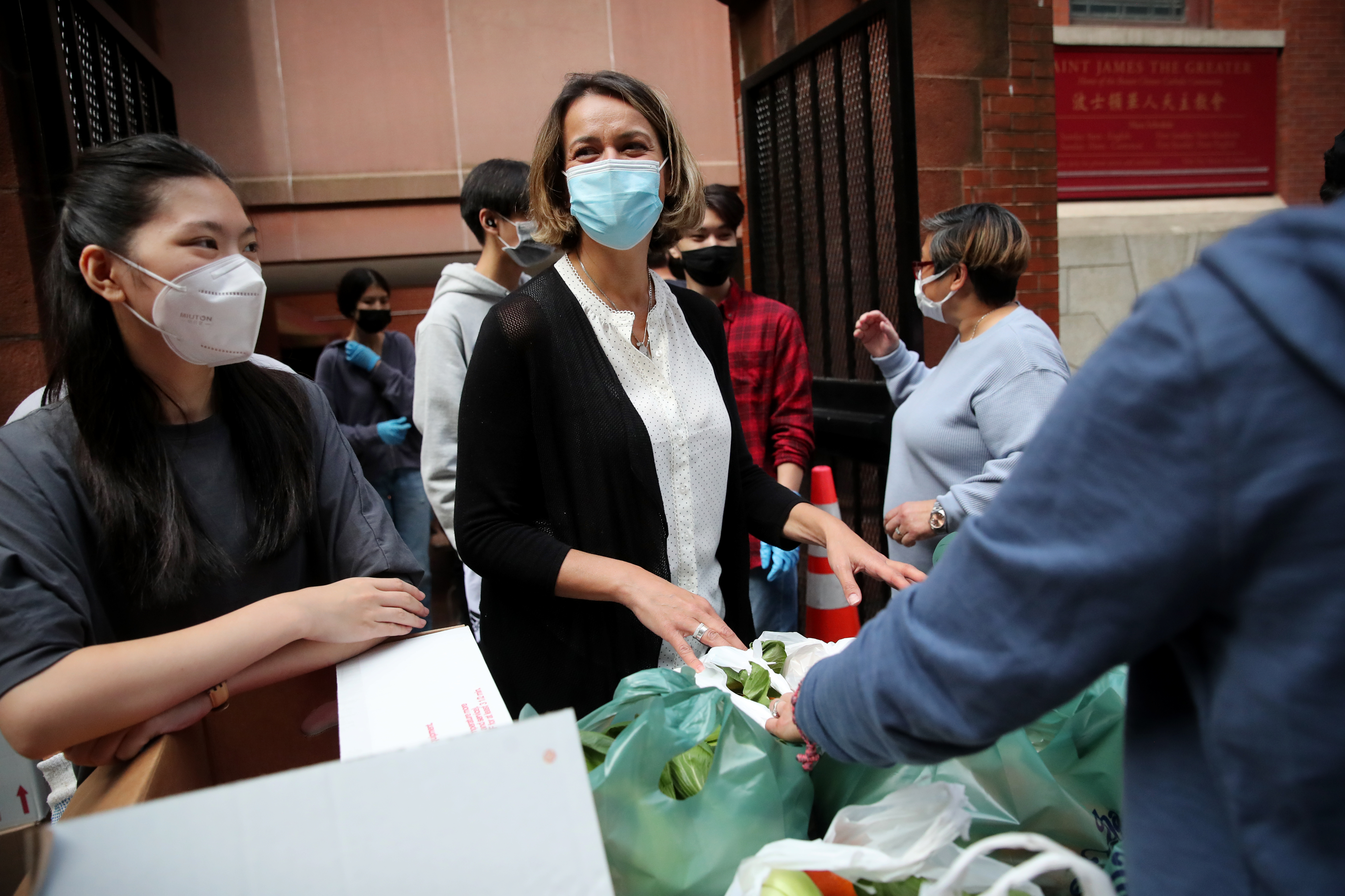 At-Large City Councilor and mayoral candidate Annissa Essaibi George helped distribute food while volunteering at the Chinatown Main Street, Food Access Program in the Chinatown neighborhood of Boston on Saturday.