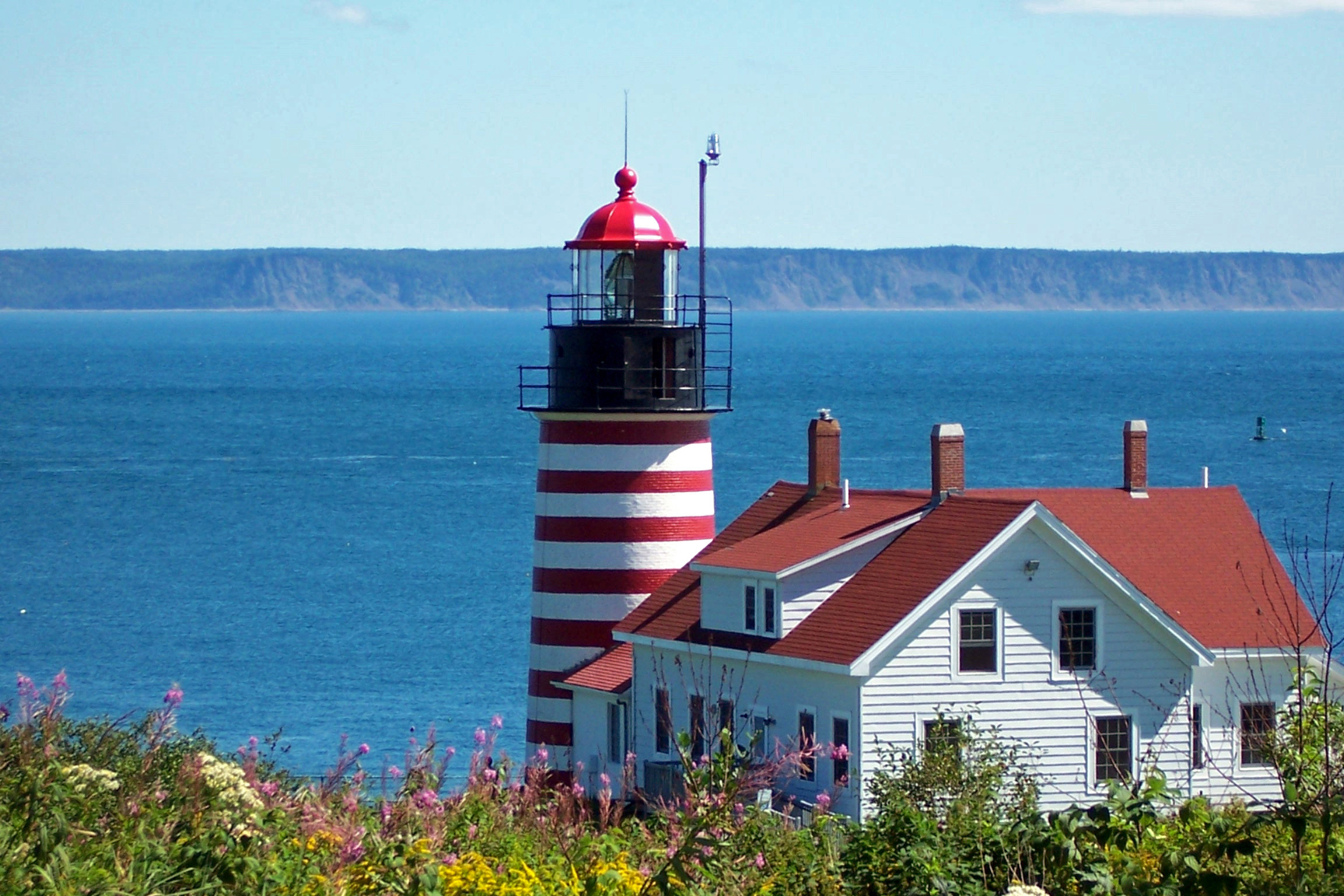 The West Quoddy Head Light Station. You can sleep over at the property.