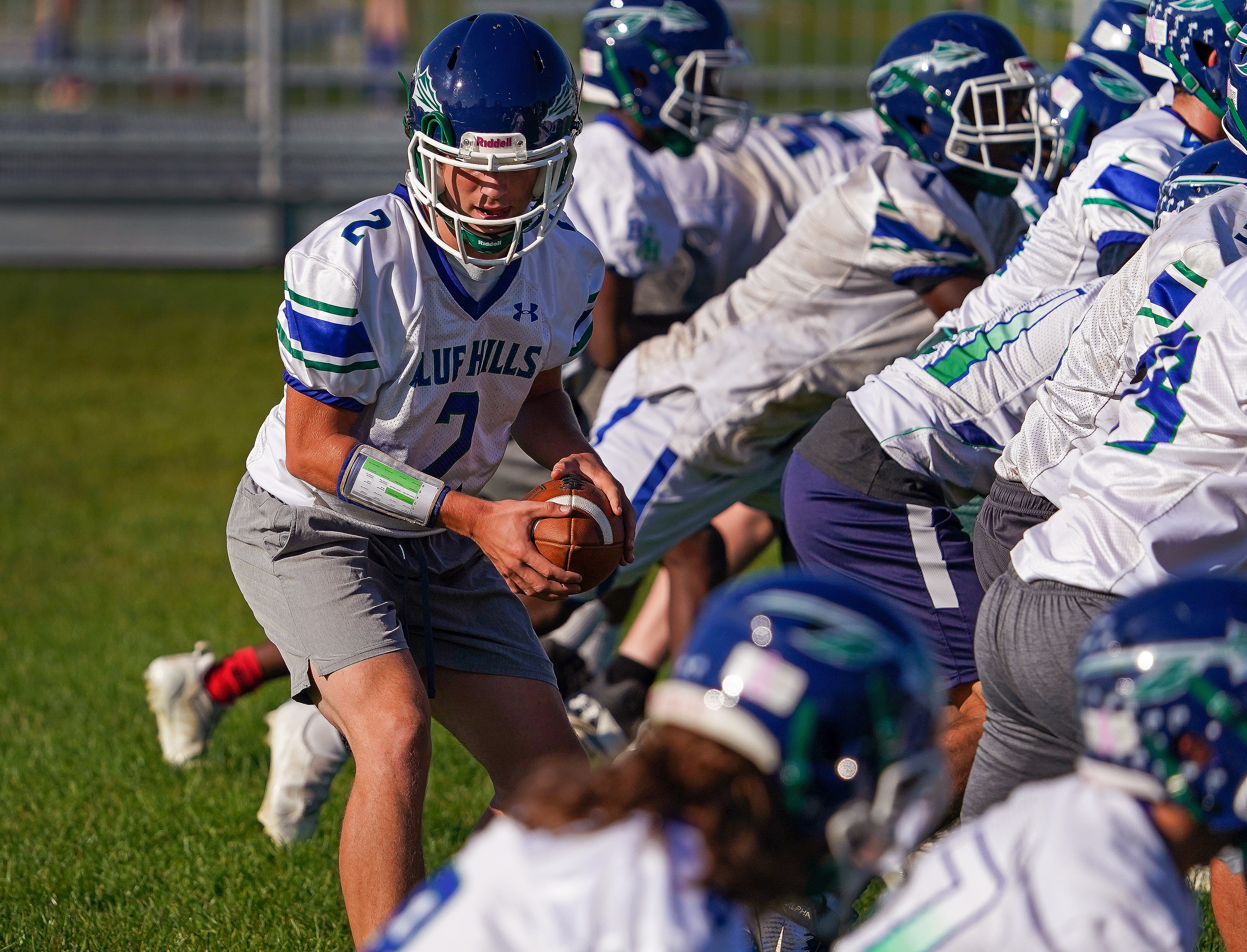 Senior quarterback Anthony Graziano runs a play for Blue Hills during Thursday's practice.