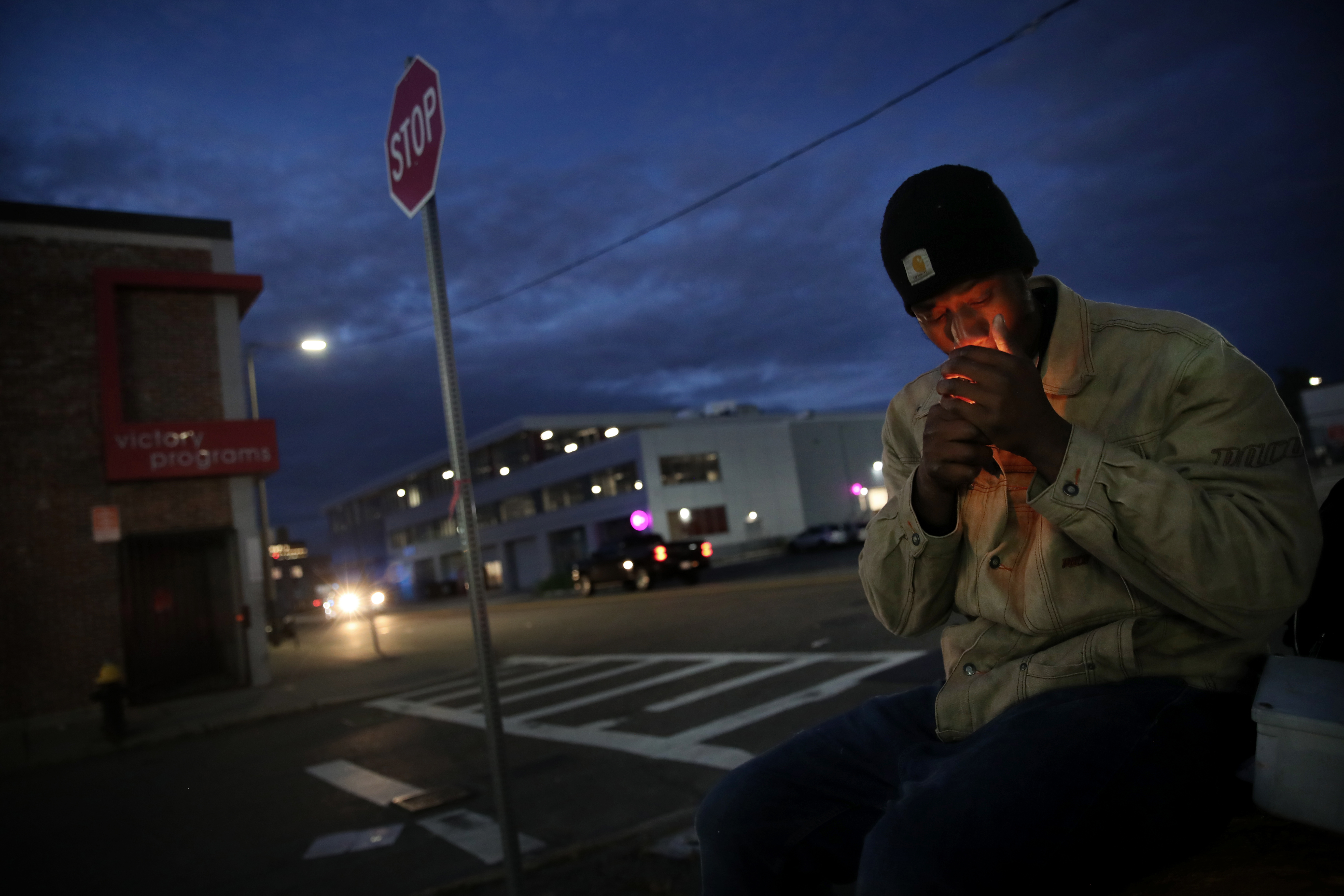 A man who goes by the name Hugo lit a cigarette on Massachusetts Avenue.