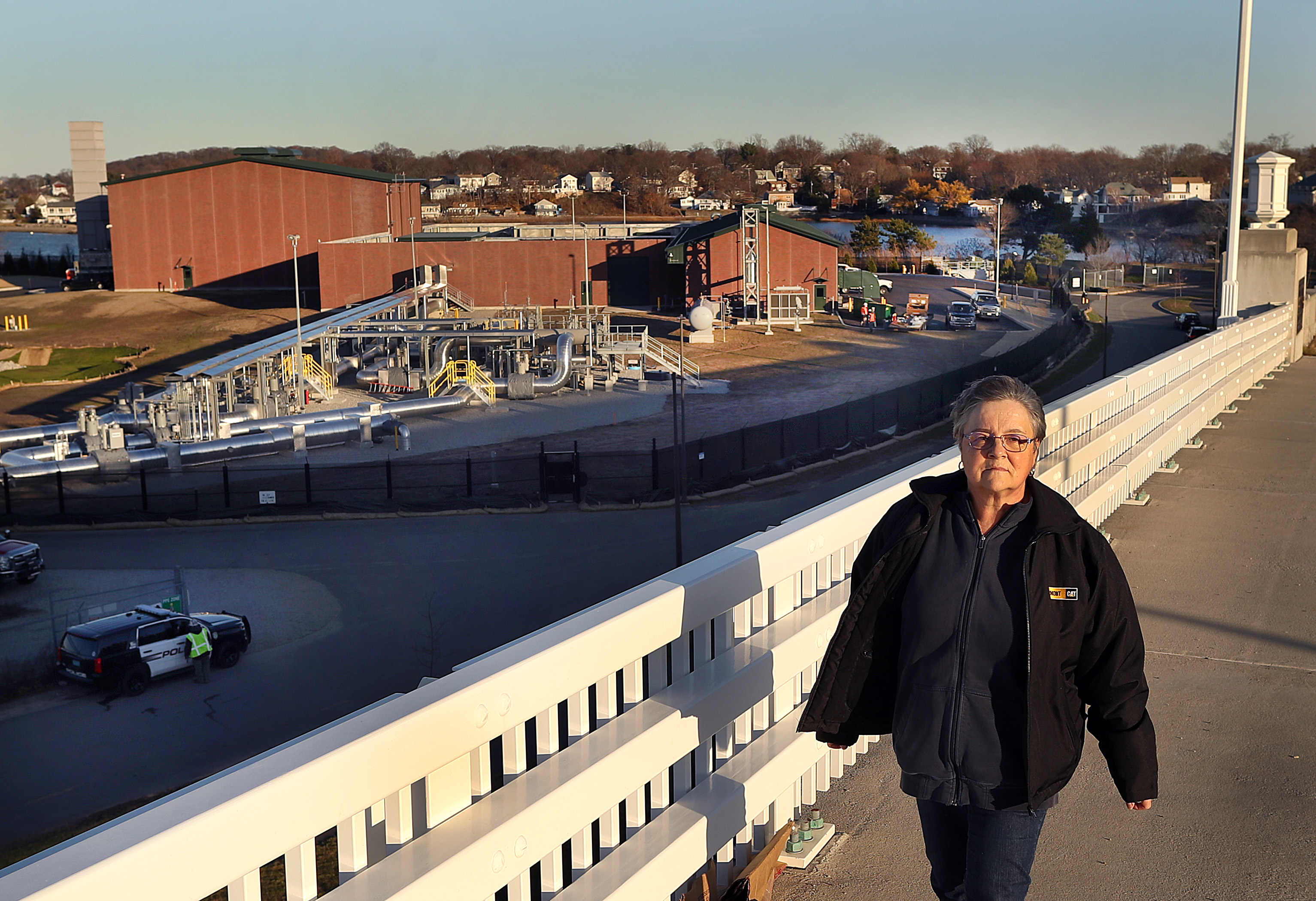 Early this month, Alice Arena surveyed the completed compressor station from the top of the Fore River Bridge. Members of her group, the Fore River Residents Against the Compressor Station (FRRACS), have been protesting for the past six years.