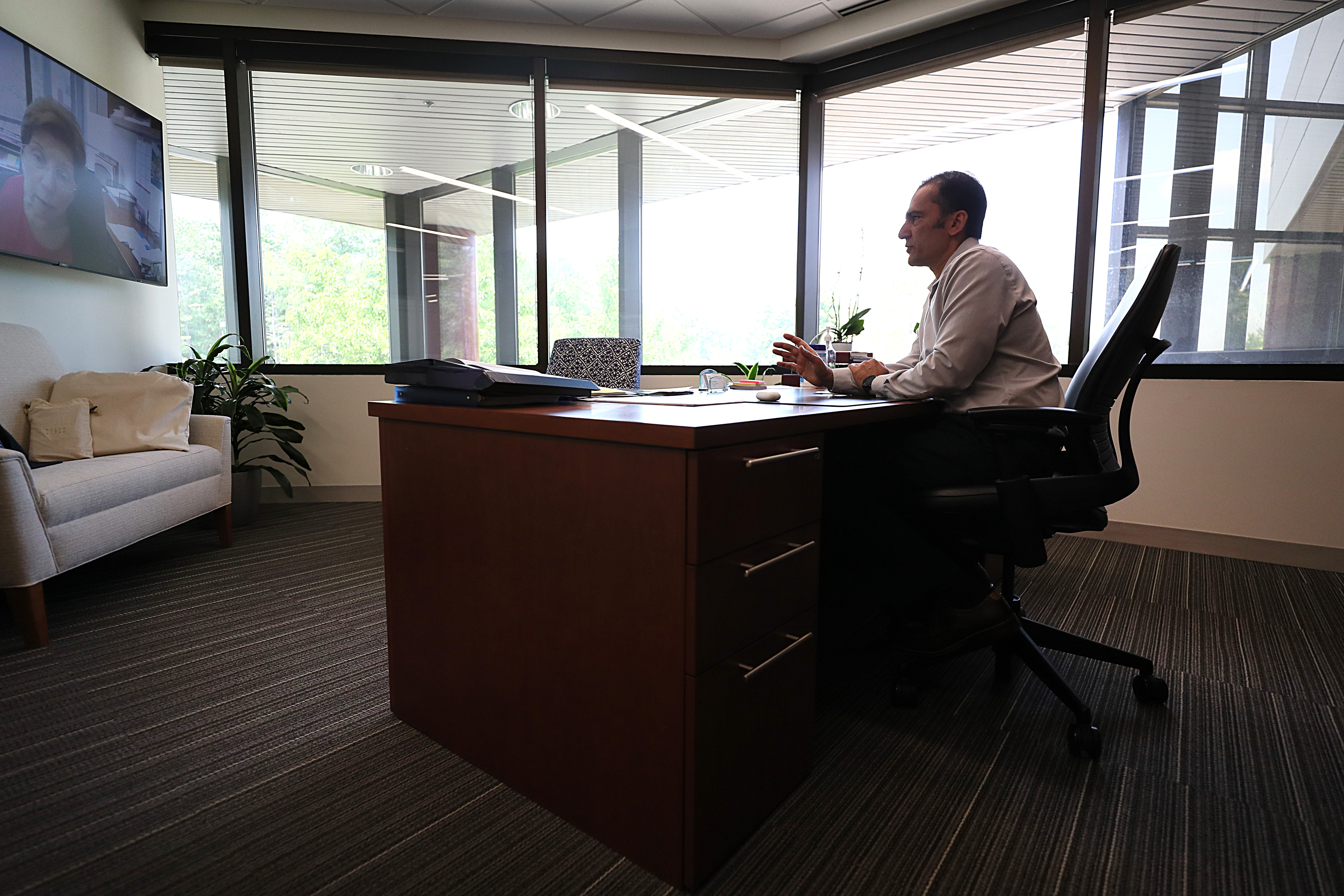 Udit Batra, who runs Waters Corp in Milford, won't be flying to Europe as often as he did before the pandemic.