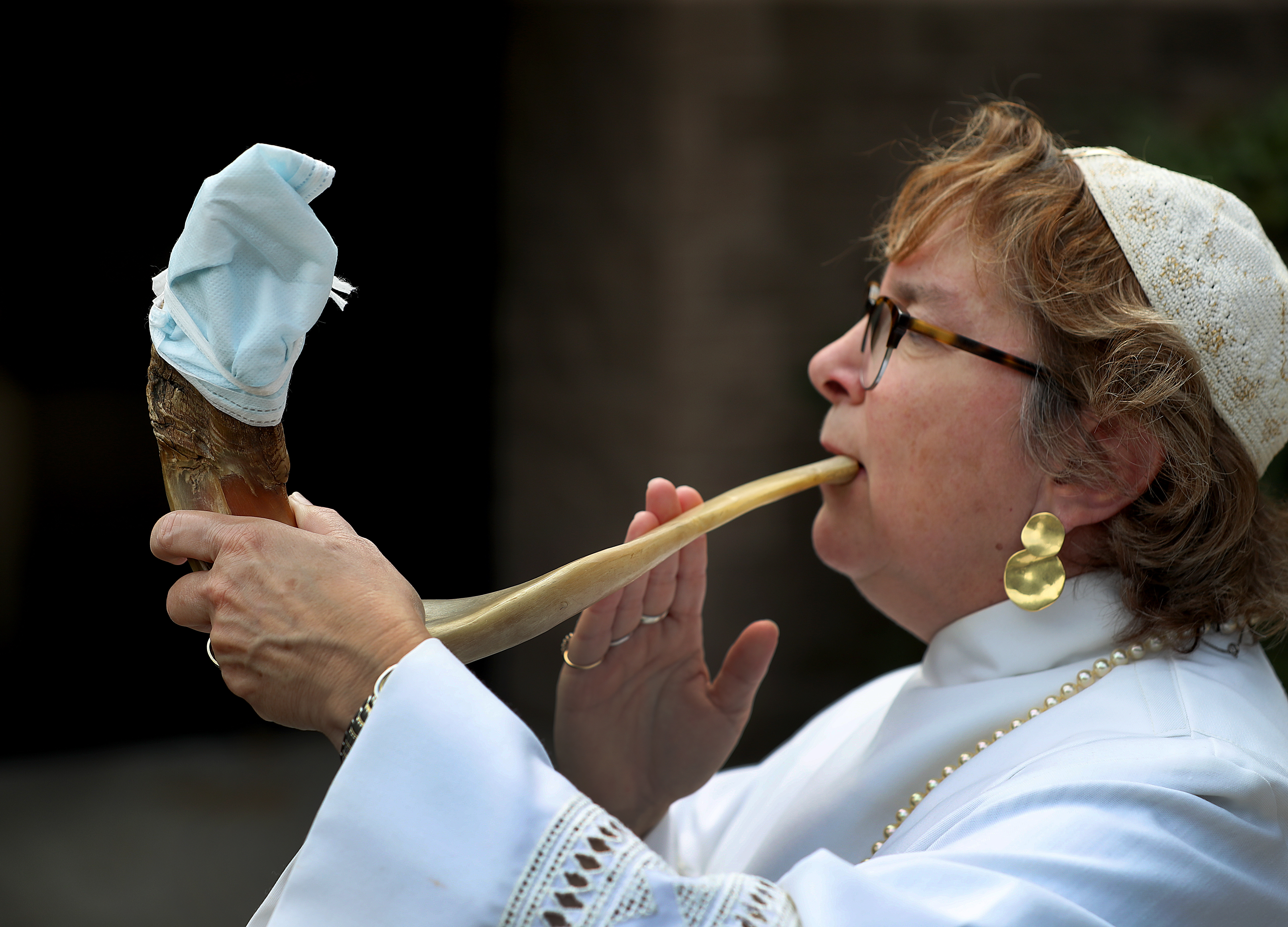 Rabbi Andrea Gouze of Temple Beth Emunah in Easton will cover the end of the shofar to prevent a spread of germs during the High Holidays.