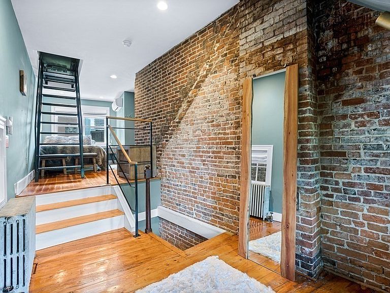 The master bedroom of the Skinny House, Boston's narrowest dwellings, located in the North End.