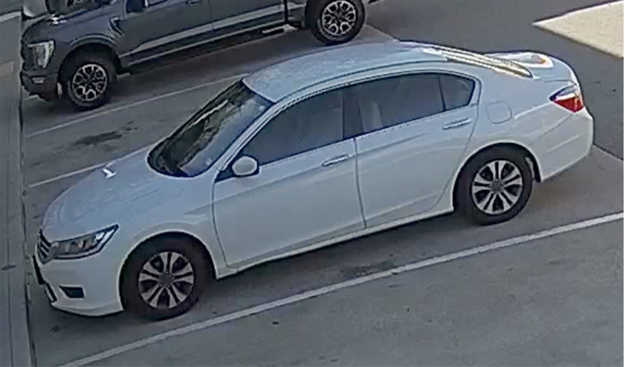 The rental car — a white 2014 Honda Accord — the suspects are believed to be driving.