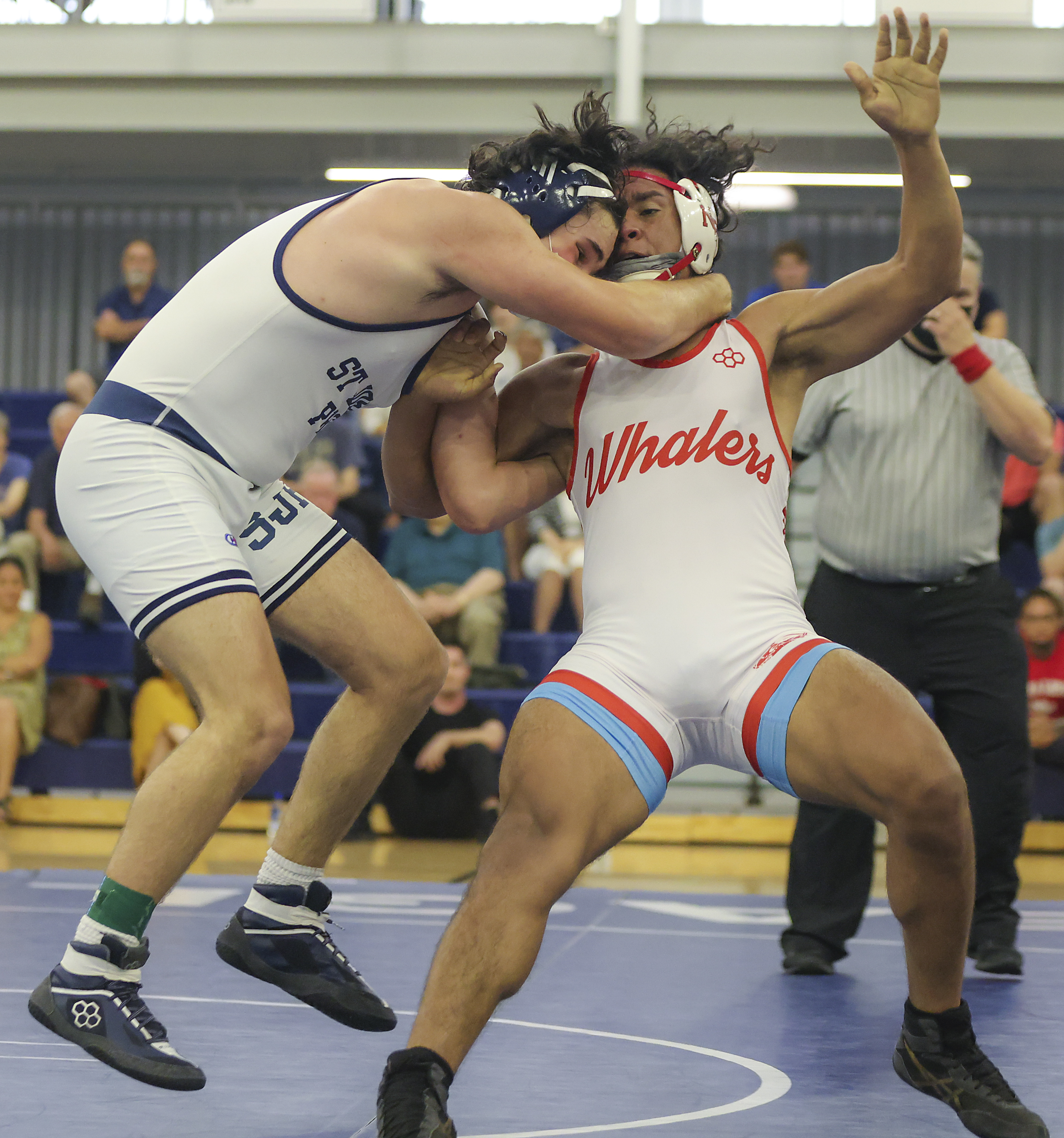 St. John's Prep Dylan Greenstein gets airborne against New Bedford High Jose Bonilla during the 195 pound class in the D1 state wresting final at St. John's Prep