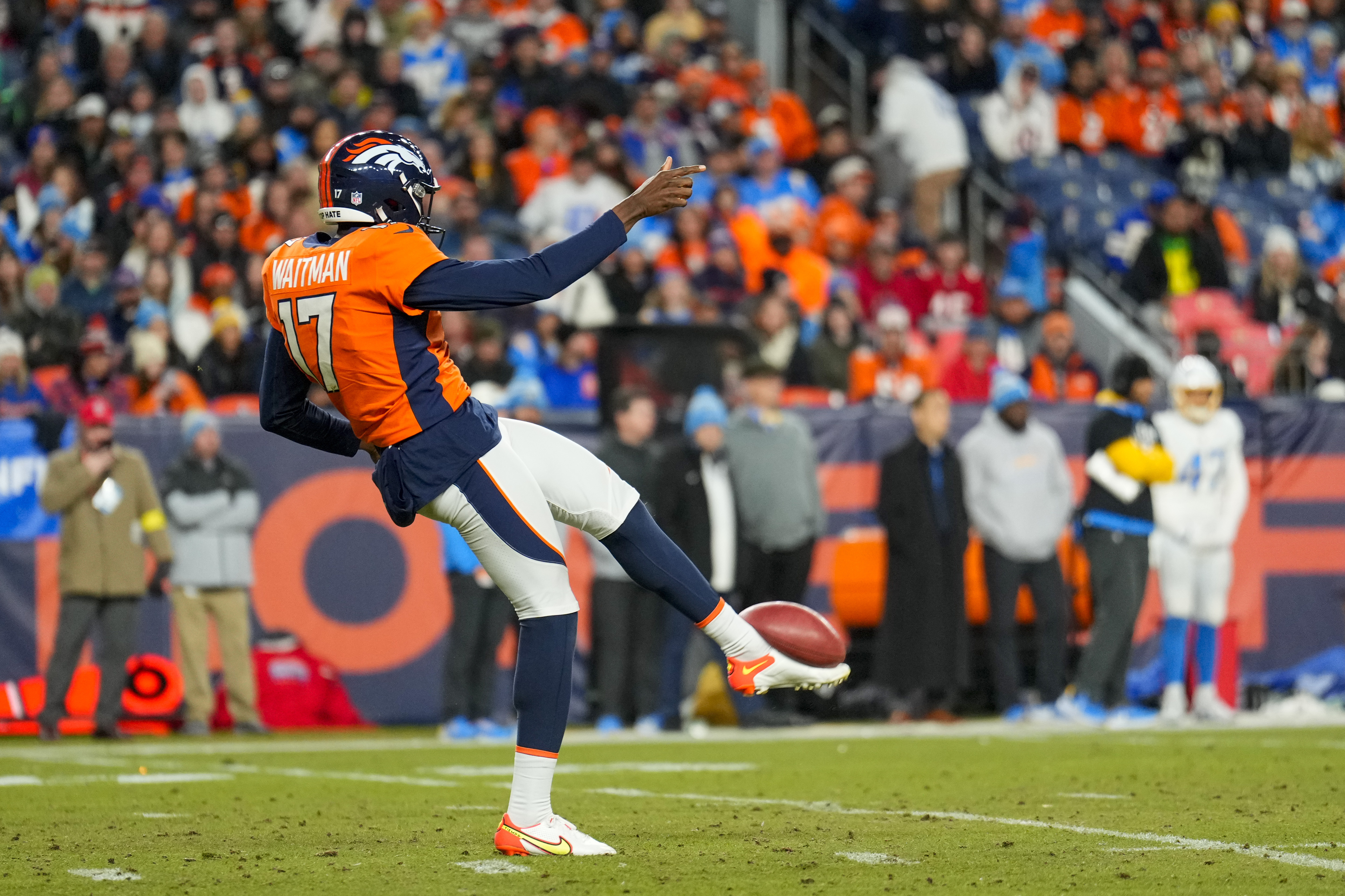 Denver Broncos punter Corliss Waitman's 47-yard punt pins the San