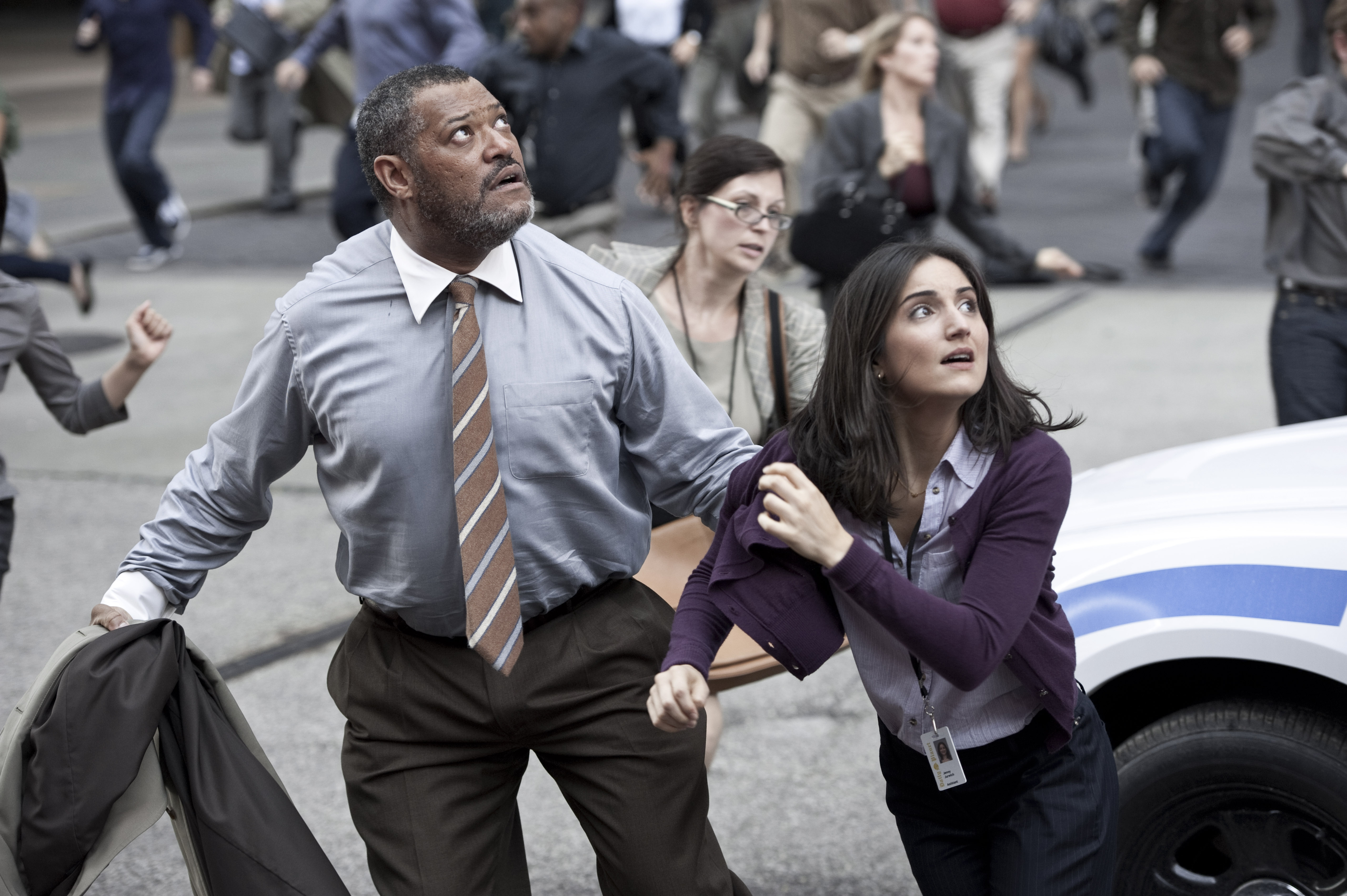 Laurence Fishburne as Perry White and Rebecca Buller as Jenny.