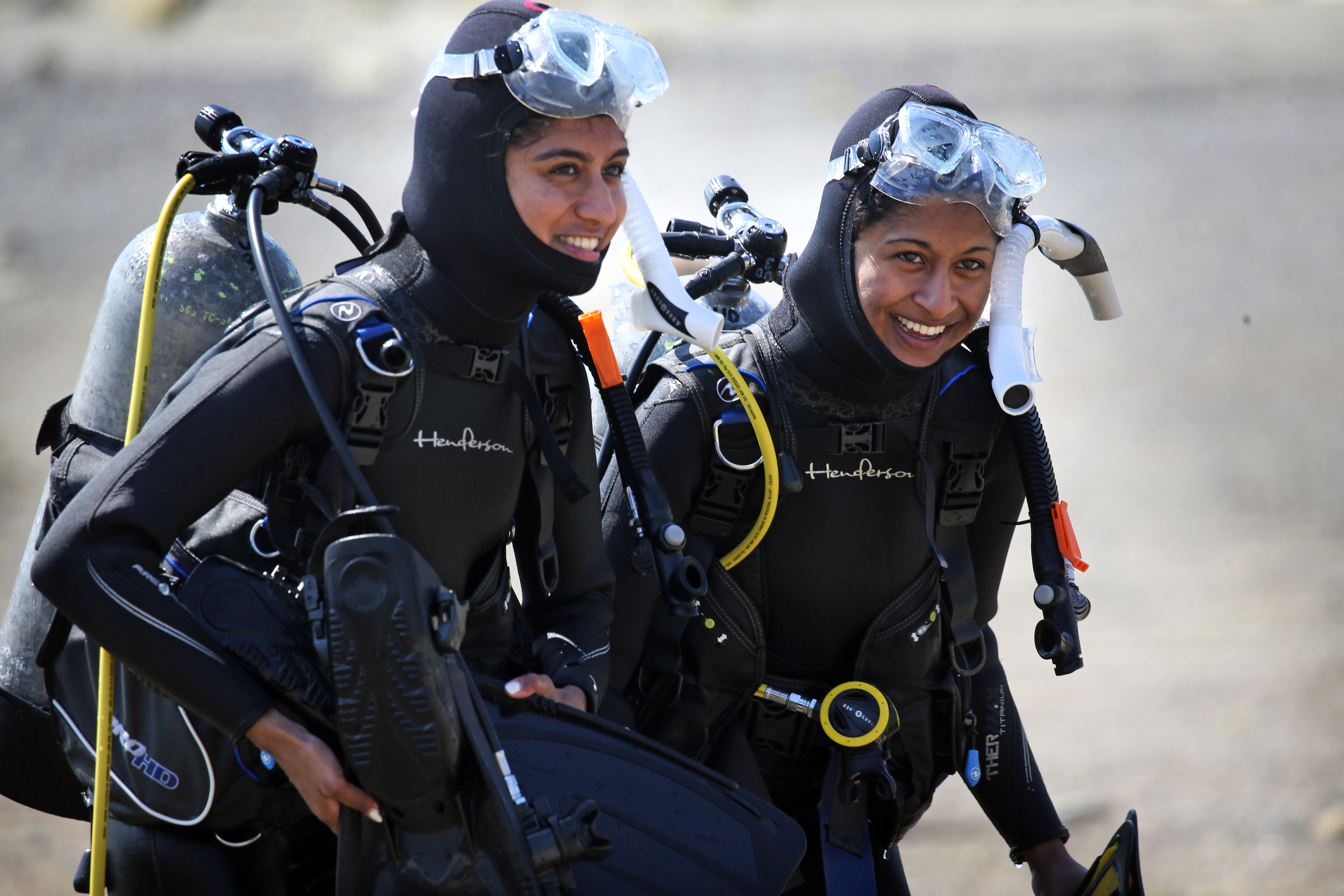 Aparna Azavilla (left) and her sister Anoushka returned to shore after a diving class at Back Beach in Rockport.