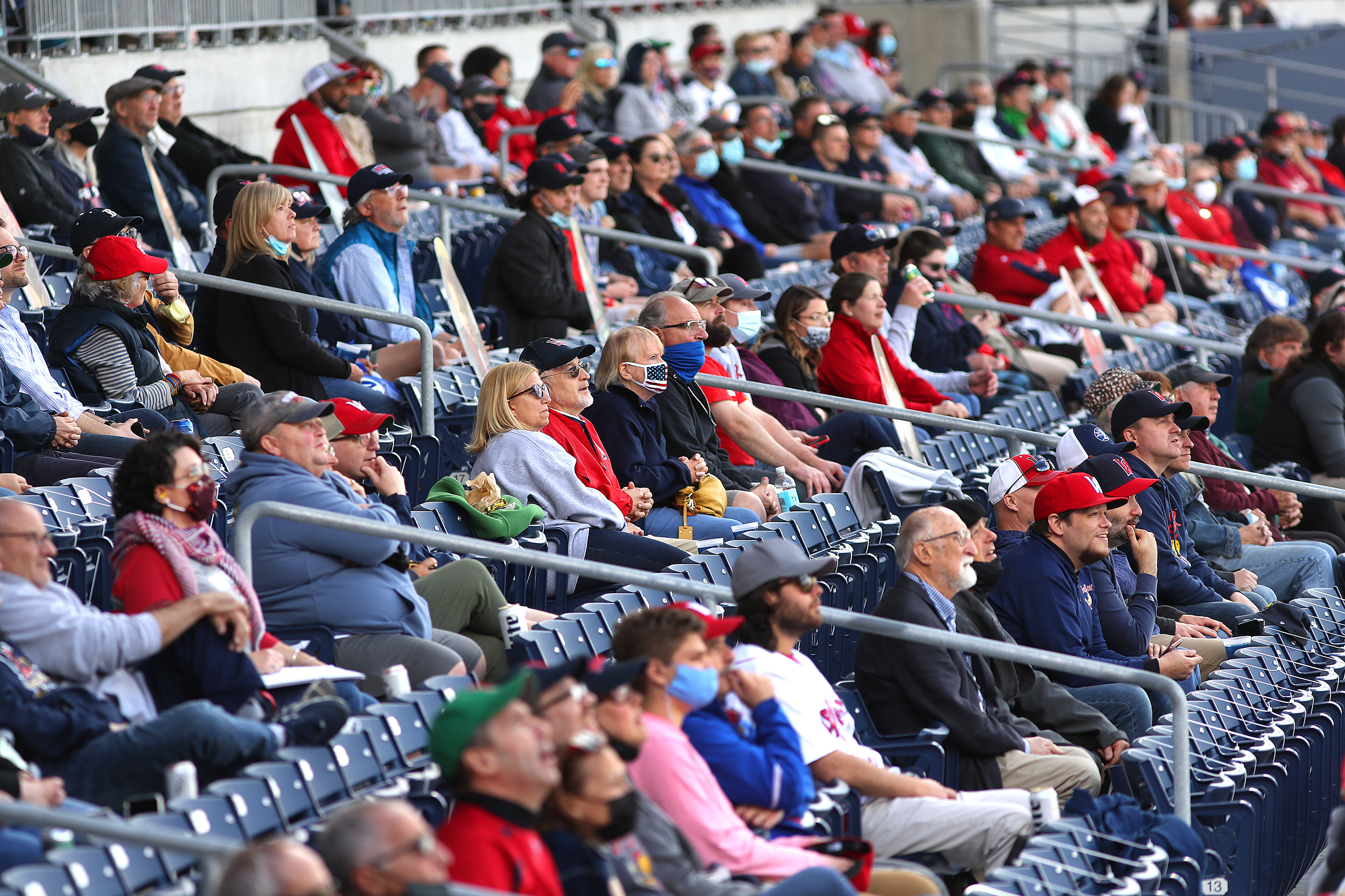 Fans watched the first inning from left field grandstands.
