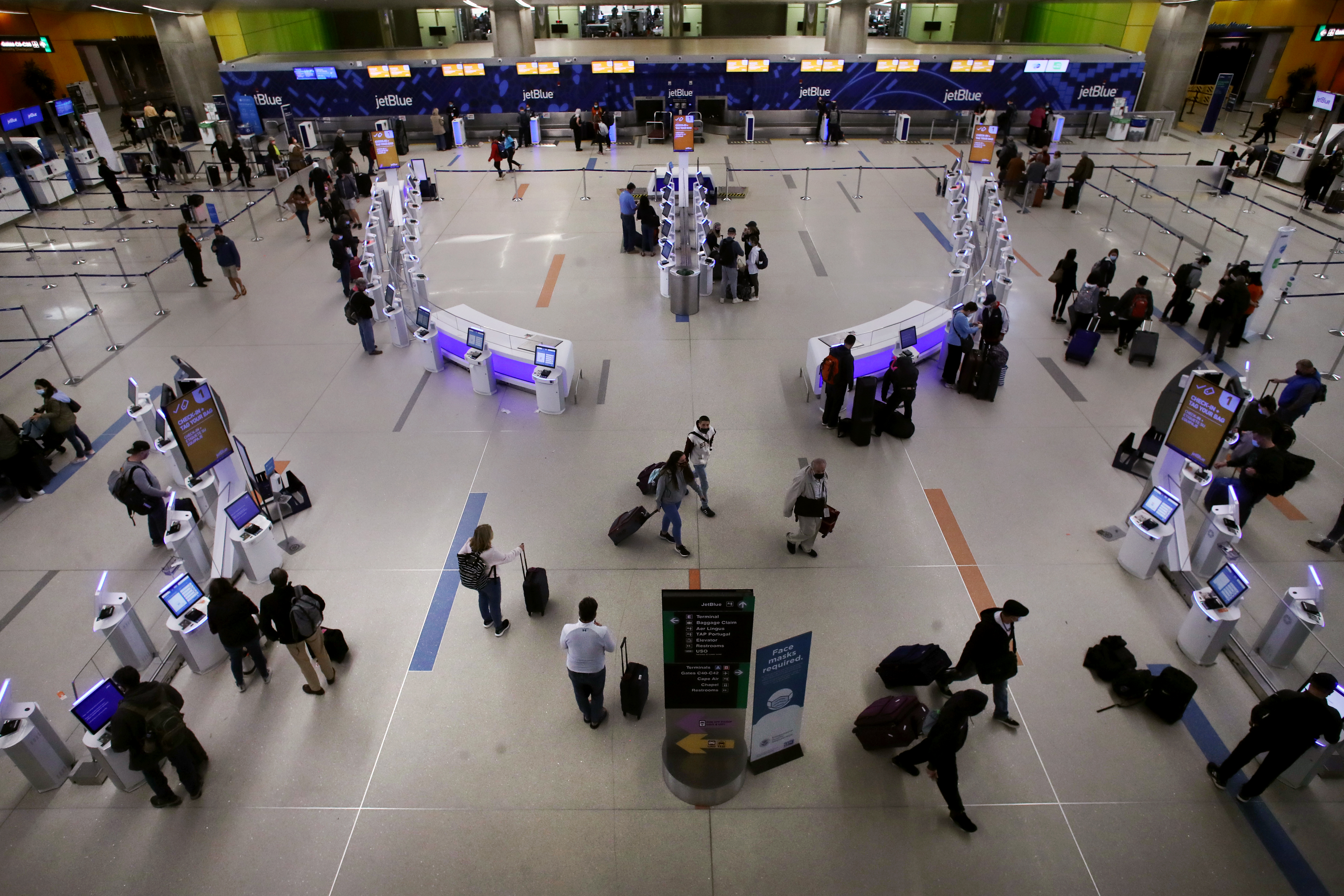 Passengers checked in at Terminal C at Boston Logan International Airport.