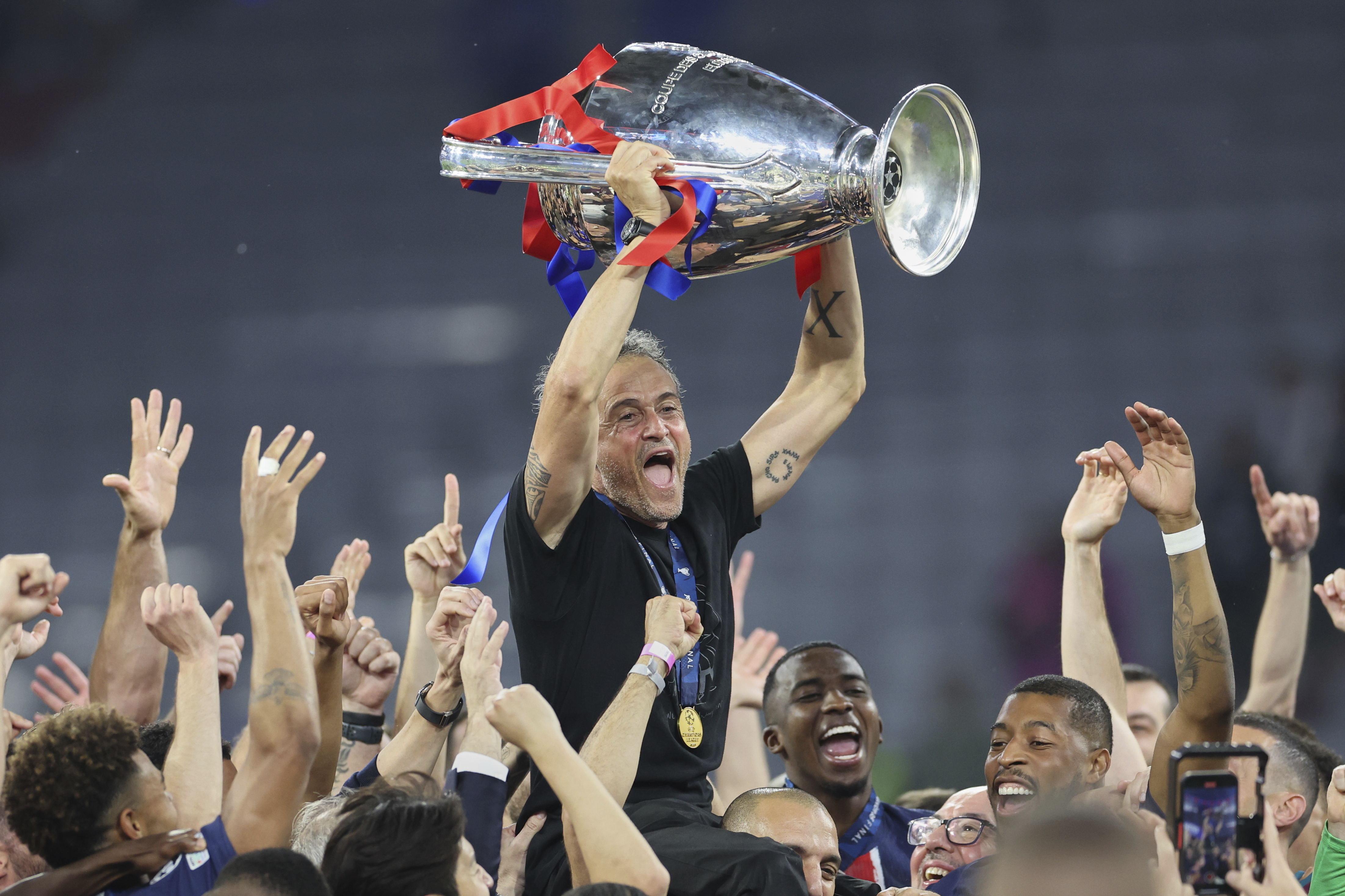 Two fans died, police officer in coma after Champions League