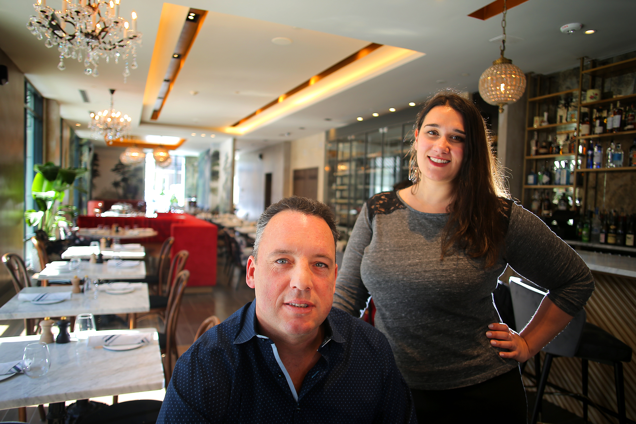 Owners Sandrine Rossi and Loic LeGerrec at Colette Wine Bistro in Porter Square in Cambridge.
