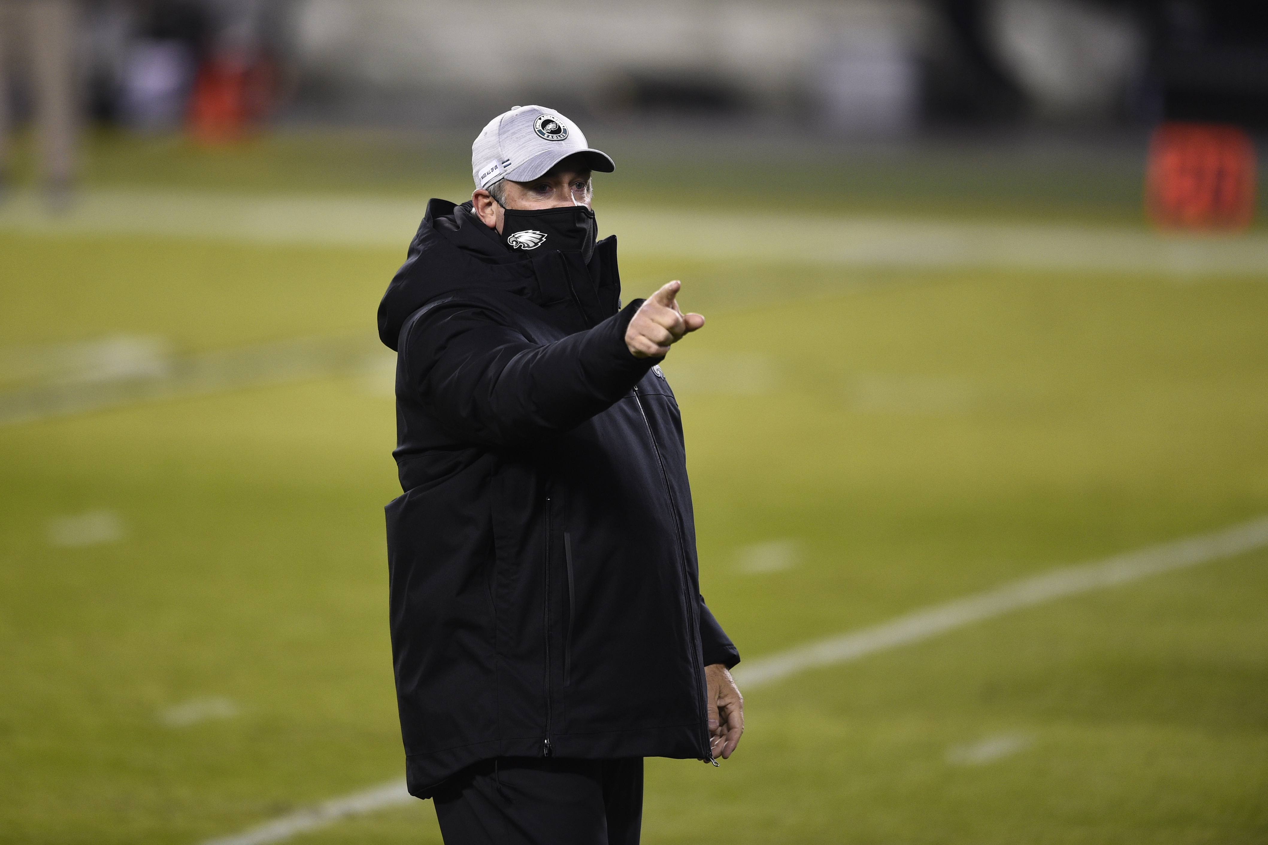 Doug Pederson walks the field before Sunday's loss.