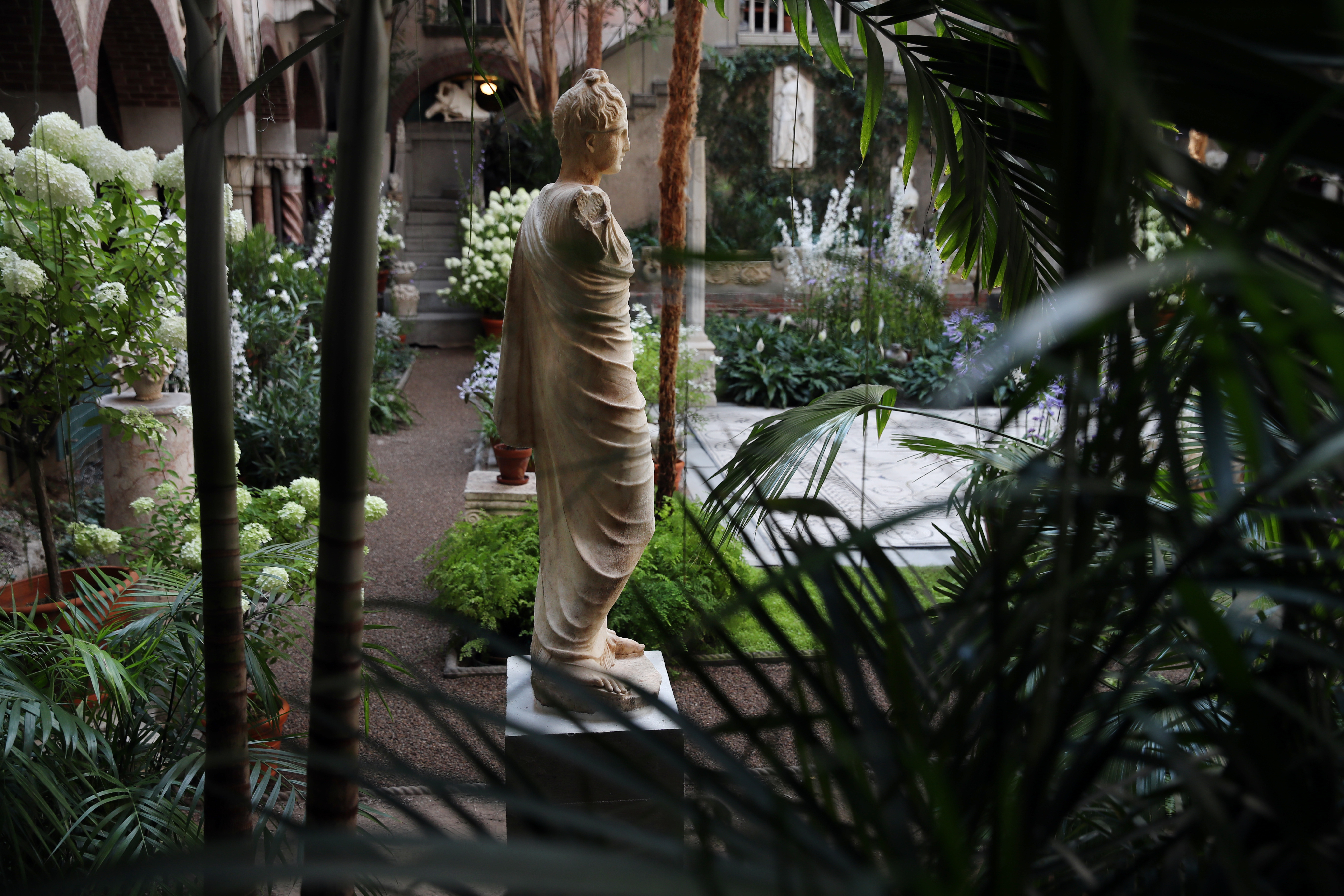 Persephone stands tall on her new pedestal in the museum's courtyard.