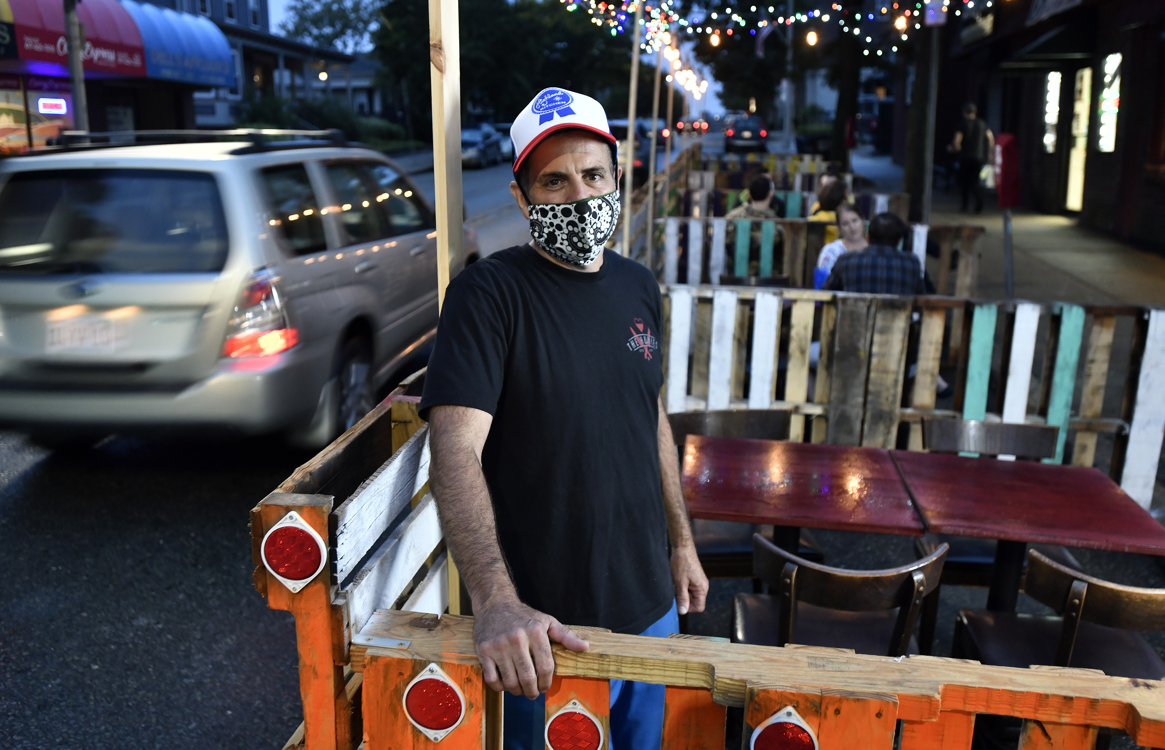 Mark Romano, owner of Highland Chicken, in new outdoor seating.
