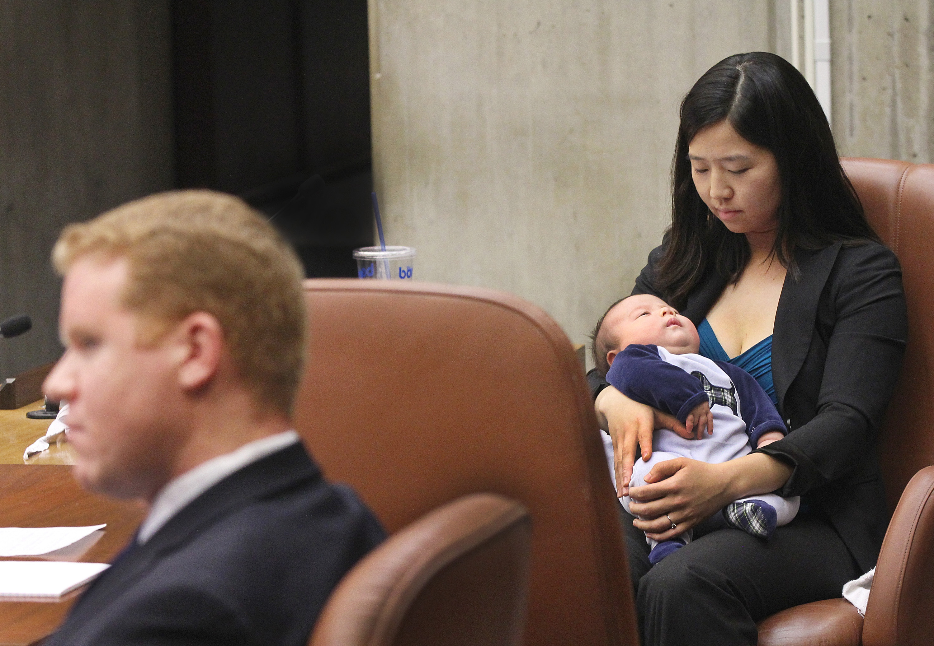 Boston City Councilor Michelle Wu tended to her 11-week-old son, Blaise Pewarski, during a hearing in 2015.