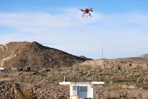 An Americans Robotics drone flew above the crate it enters and exits autonomously.