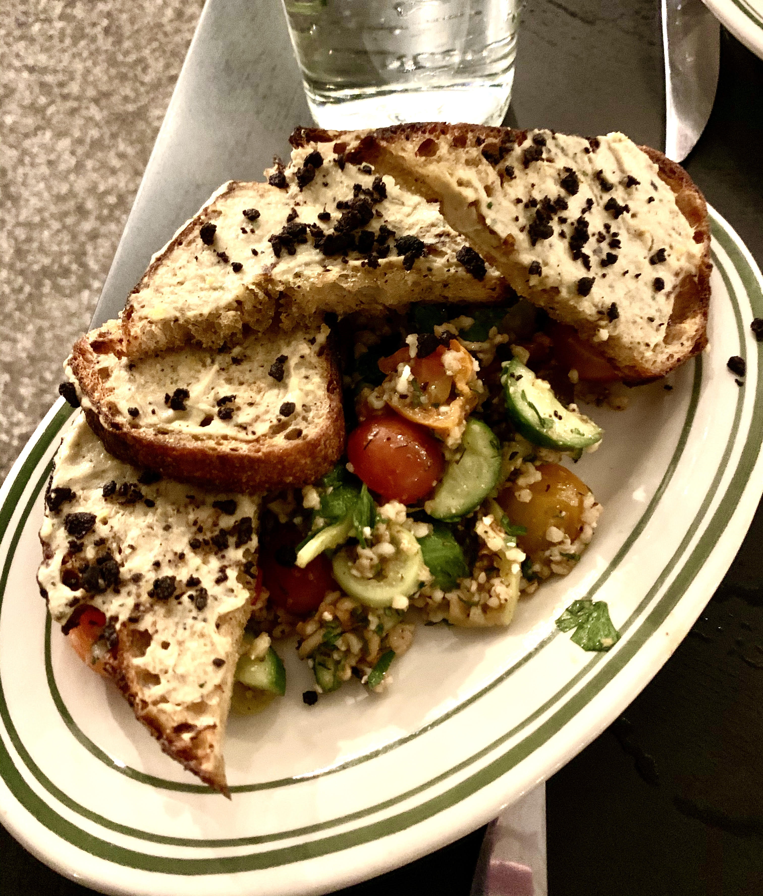 At Craigie Next Door, chef and owner Tony Maws is offering a prix fix menu that recently included grilled bruschetta with zucchini hummus and olives served on freekeh salad with cherry tomatoes and cucumbers.