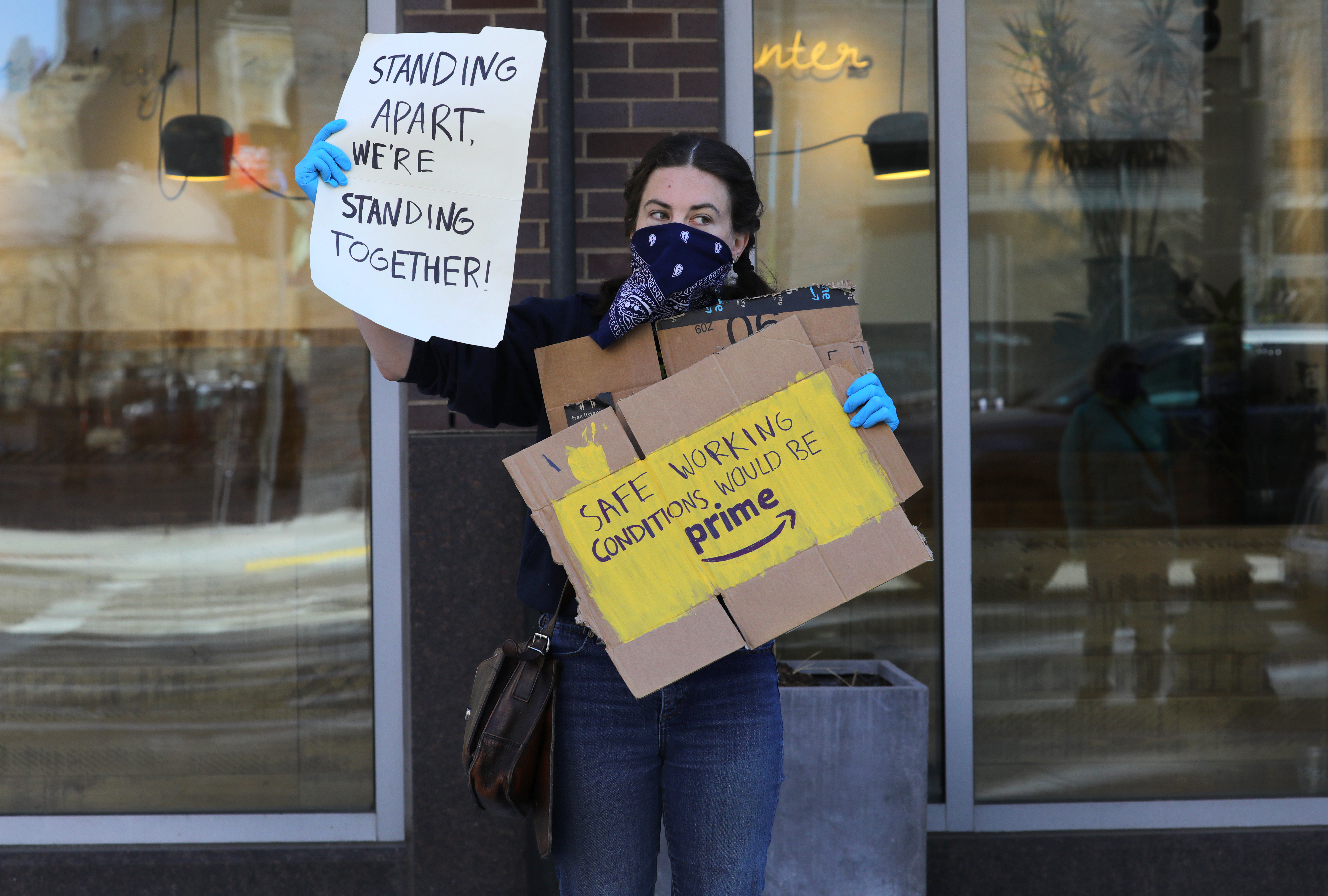 Boston, MA  4/7/2020  Grocery workers and others stage a protest rally outside the Whole Foods Market, in the South End, to demand personal protective equipment, added benefits if needed and hazard pay, during the coronavirus pandemic.  (Pat Greenhouse/Globe Staff)