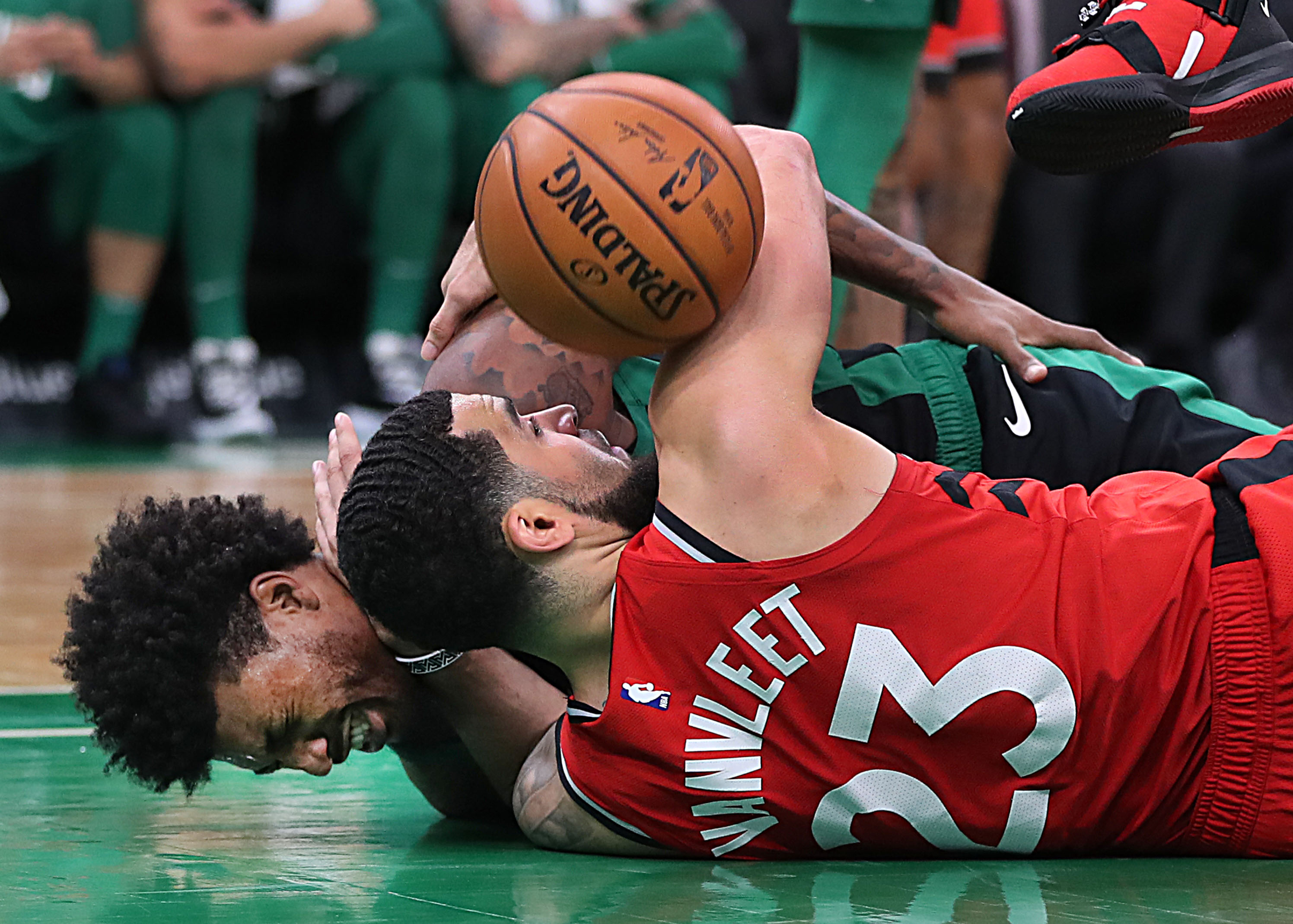 Celtics guard Marcus Smart and Toronto Raptors guard Fred VanVleet fell to the floor after colliding during Toronto’s 113-97 victory at TD Garden on Dec. 28.