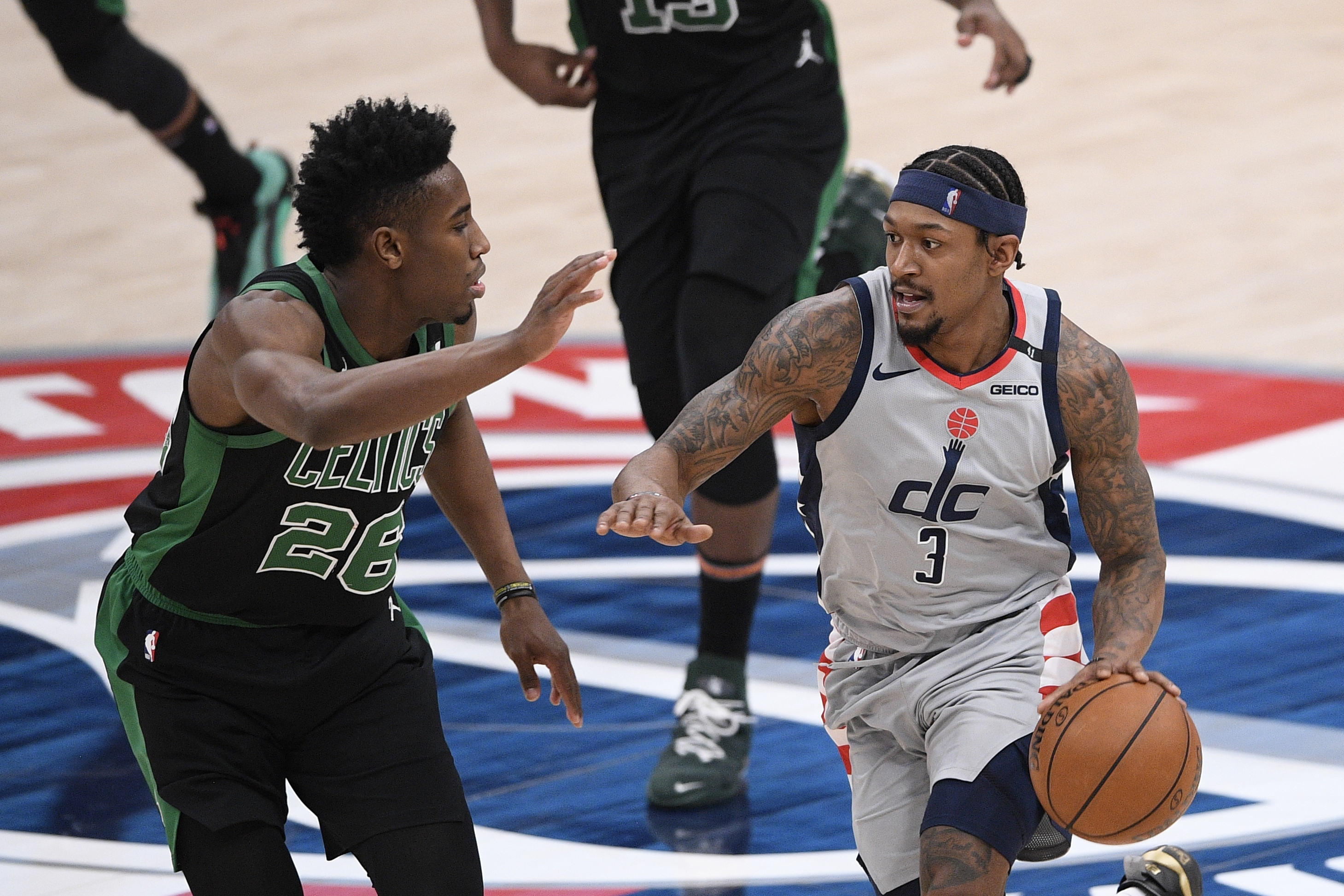 Washington's Bradley Beal dribbles the ball against Aaron Nesmith during the second half of Sunday's contest.