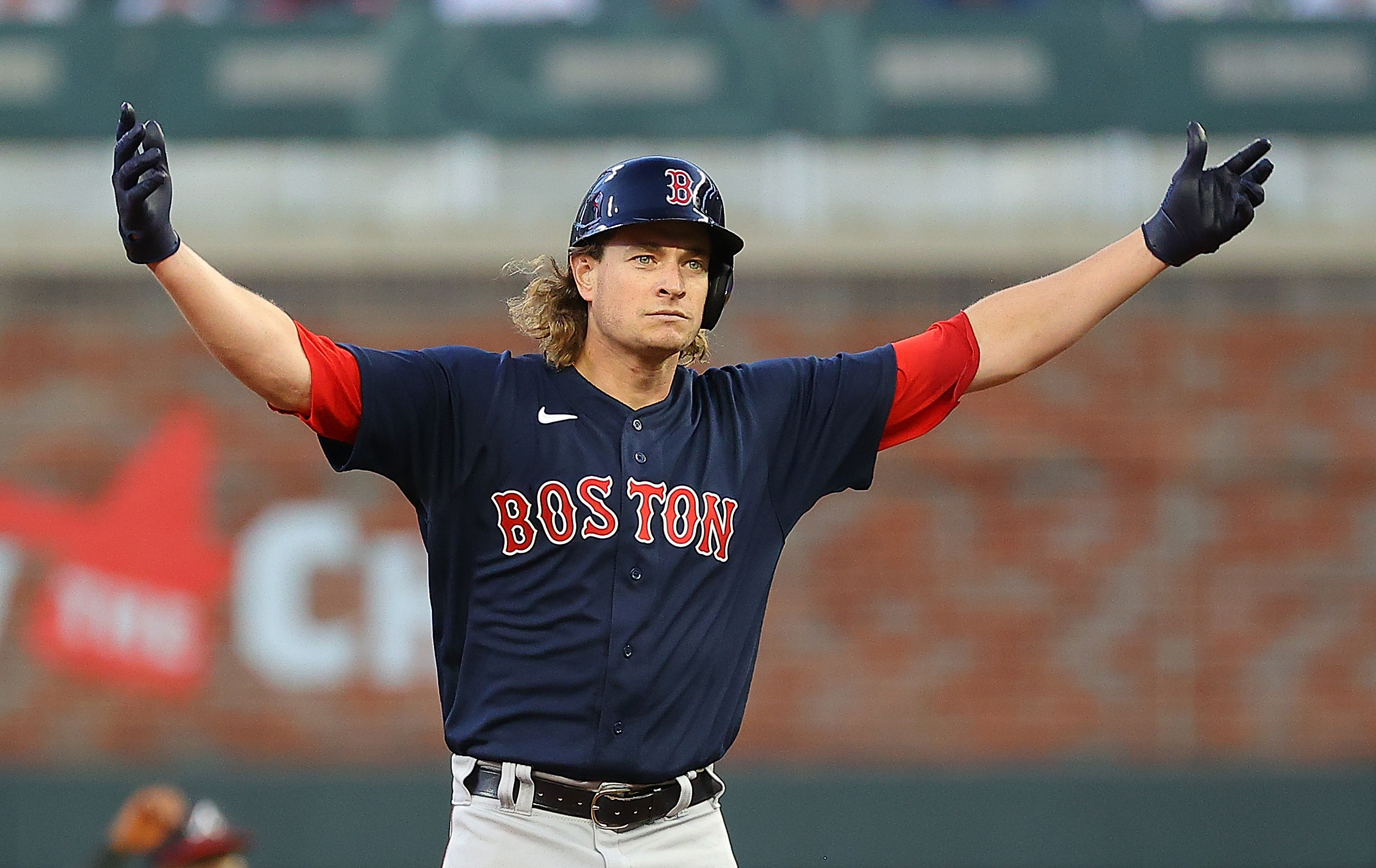 Garrett Richards may have struggled on the mound, but he helped his cause at the plate with an RBI double for his first career hit in the major leagues in the fourth inning of Wednesday night's 10-8 win over the host Atlanta Braves.