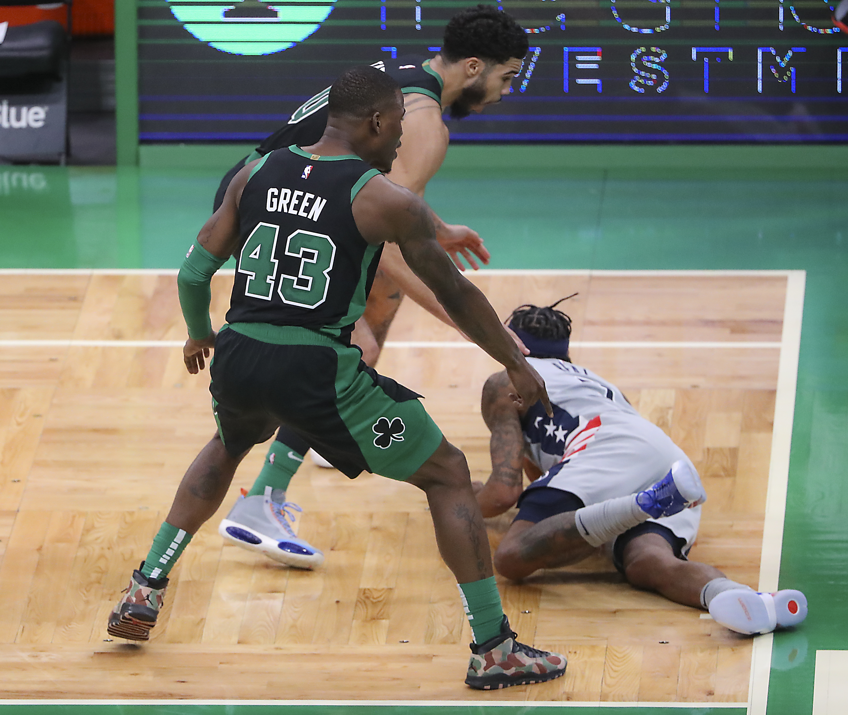 Jayson Tatum and Javonte Green forced Washington's Bradley Beal into a critical final-minute turnover, a huge part of the Celtics eking out a victory Sunday at TD Garden.